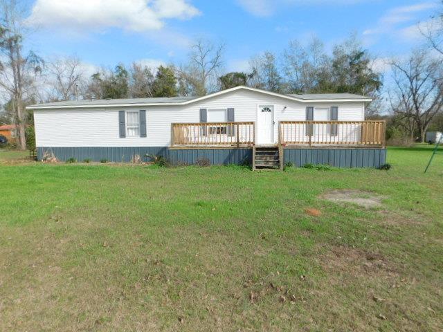 Charming, 3 bed, 2 bath double wide nestled on 2.34 acres in Baconton! Enjoy country living on your private lot! The home offers a white exterior, with metal skirting, and a large wooden front deck, and a spacious open yard! Conveniently located in the Baconton Charter school district, and in between Camilla and Albany. Call today for a showing!