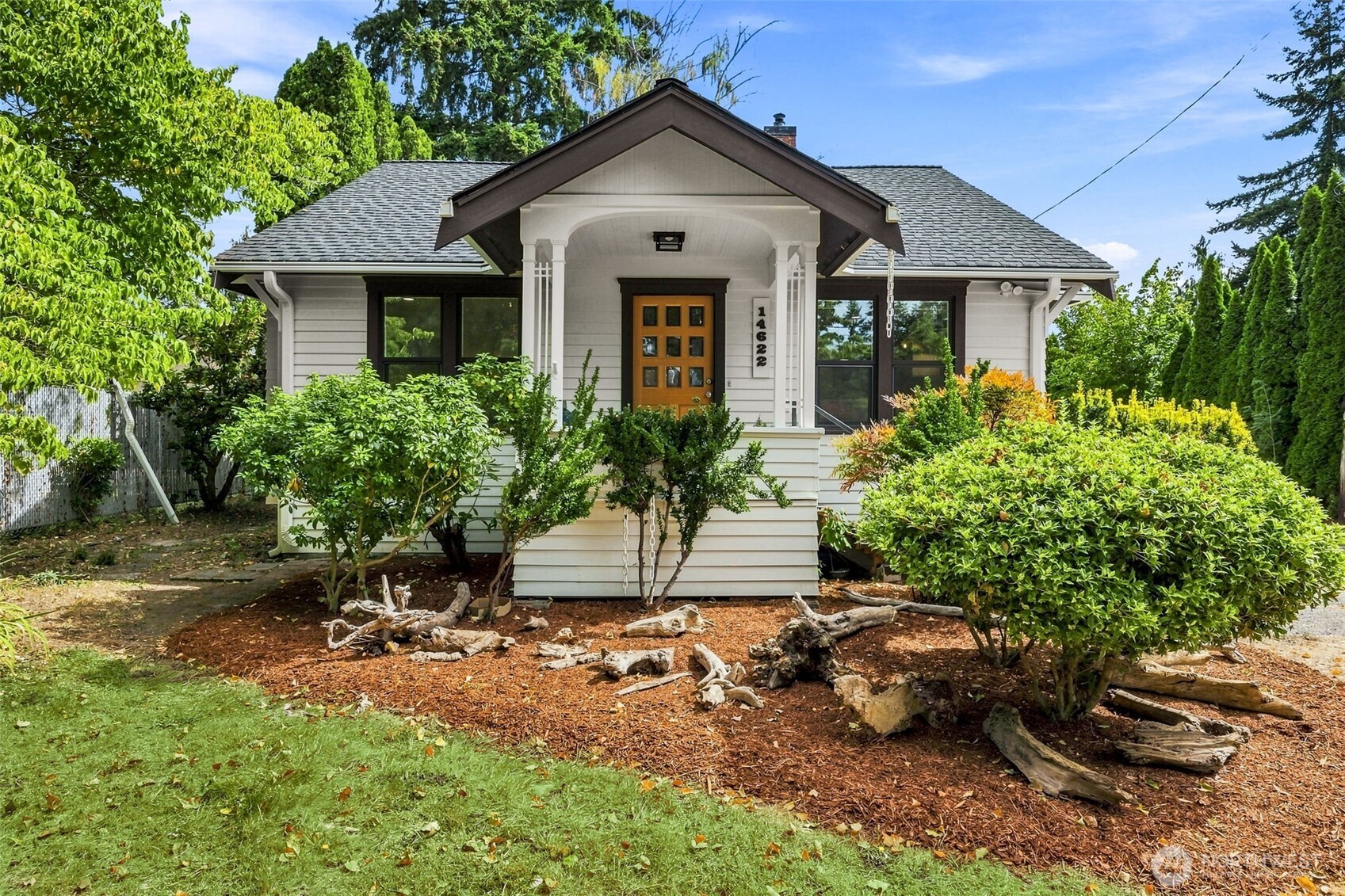 Step back in time with this beautifully restored 1922 Craftsman in the highly sought-after Seahurst neighborhood. Thoughtfully renovated - including seismic retrofitting - while preserving its timeless charm, this inviting home offers two spacious primary suites on the main floor, a warm and welcoming living room with a cozy gas fireplace, and a beautifully updated kitchen with modern touches that seamlessly blends classic style with today's conveniences. The charming dining room showcases original built-ins and abundant windows, creating the perfect setting for gatherings. A versatile finished flex room provides endless possibilities as a home office, fitness space, hobby room or additional storage, while a convenient main-floor powder room adds functionality for guests. Upstairs, you'll find two additional bedrooms connected by a Jack-and-Jill bathroom, offering a comfortable layout that can meet a multitude of needs. Outside, enjoy beautifully landscaped grounds with mature plantings that create a private, picturesque setting, off street parking for 3+ cars and EV charging. Ideally located just a short stroll from Olde Burien's shops, restaurants, and cafés, as well as nearby parks, this home also offers an easy commuter location with convenient access to major routes. A rare blend of historic character, thoughtful updates, and an unbeatable location—this is one you won't want to miss!