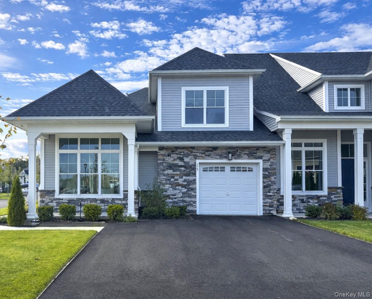 Welcome to Country Pointe Meadows, where modern elegance and timeless comfort meet in this beautifully designed end-unit townhome. New construction by Beechwood Homes, this residence features 2 bedrooms plus a den, 2.5 bathrooms, a loft, unfinished basement, and an oversized one-car garage. Designed with top-of-the-line appliances and high-end finishes, this home offers the perfect balance of style and sophistication.The vaulted ceilings and open-concept layout create a bright, airy atmosphere ideal for both entertaining and relaxing. The great room flows effortlessly into the living and dining areas, while the gourmet kitchen impresses with a large center island, custom cabinetry, and designer details. The adjoining breakfast area with its 12-foot ceiling enhances the home’s open feel, leading to a private patio perfect for outdoor gatherings.The first-floor primary suite serves as a peaceful retreat, complete with dual closets and a spa-inspired bath featuring a double vanity and elegant finishes. Upstairs, the loft offers flexible living space, the second bedroom provides comfort for guests, and the den can serve as a media room, office, or fitness area. A laundry room and unfinished basement add convenience and future potential.Enjoy outstanding community amenities including a clubhouse, snow removal, and a manned gatehouse. Relax by two heated pools with sundeck and cabanas, stay active in the fitness center, or play on the bocce or tennis courts. Socialize at indoor and outdoor bars, barbecues, and firepits, or watch sports in the lounge.Ideally located near world-class golf courses, county biking trails, and The Boulevard’s retail center with shopping, dining, healthcare, and entertainment options, this home offers the ultimate in luxury and lifestyle.Sale may be subject to terms and conditions of an offering plan. Buy directly from the builder with a 1-year warranty included. Furniture sold separately. Purchaser will receive offering plan for verification of monthly maintenance charges and financial information at time of purchase (actual fees may vary).