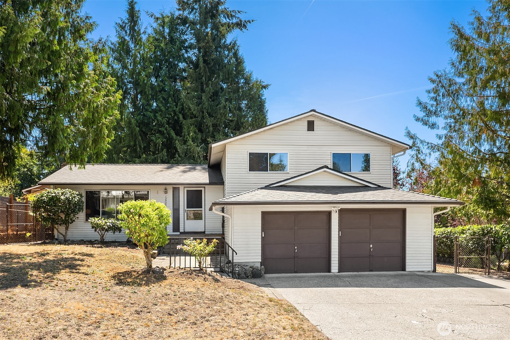 Welcome home to this beautifully remodeled residence, thoughtfully updated to meet today's lifestyle. Every detail has been carefully selected to create a home that is both stylish & functional. The stunning kitchen is the heart of the home, featuring classic shaker-style cabinetry, elegant quartz cntrtps, SS applncs, & a charming breakfast nook—perfect for morning coffee or casual dining. Retreat to the spacious primary suite, complete w/ a walk-in closet & beautifully remodeled en-suite bath showcasing shaker-style cabinetry & quartz cntrtps. Freshly painted thru-out, the home also features new luxury vinyl plank & tile flooring, updated lighting, new interior doors, & modern hardware, providing a fresh, contemporary feel from room to room. Gather around the cozy brick-faced frplc in the inviting family rm, an ideal space to relax & unwind. Sliding doors open to the bkyard patio, seamlessly blending indoor & outdoor living. Formal living & dining rms offer elegant spaces for entertaining guests, while the expansive deck is ready for summer barbecues & casual gatherings w/ friends. Outside, the mature landscaping creates a private, park-like oasis, offering beauty, tranquility, & the perfect setting to enjoy the outdoors. Adding even more value & peace of mind is a new roof, making this exceptional home truly move-in ready. Don't miss this wonderful opportunity to own a beautifully updated home that combines timeless style, quality upgrades, & comfortable living.
