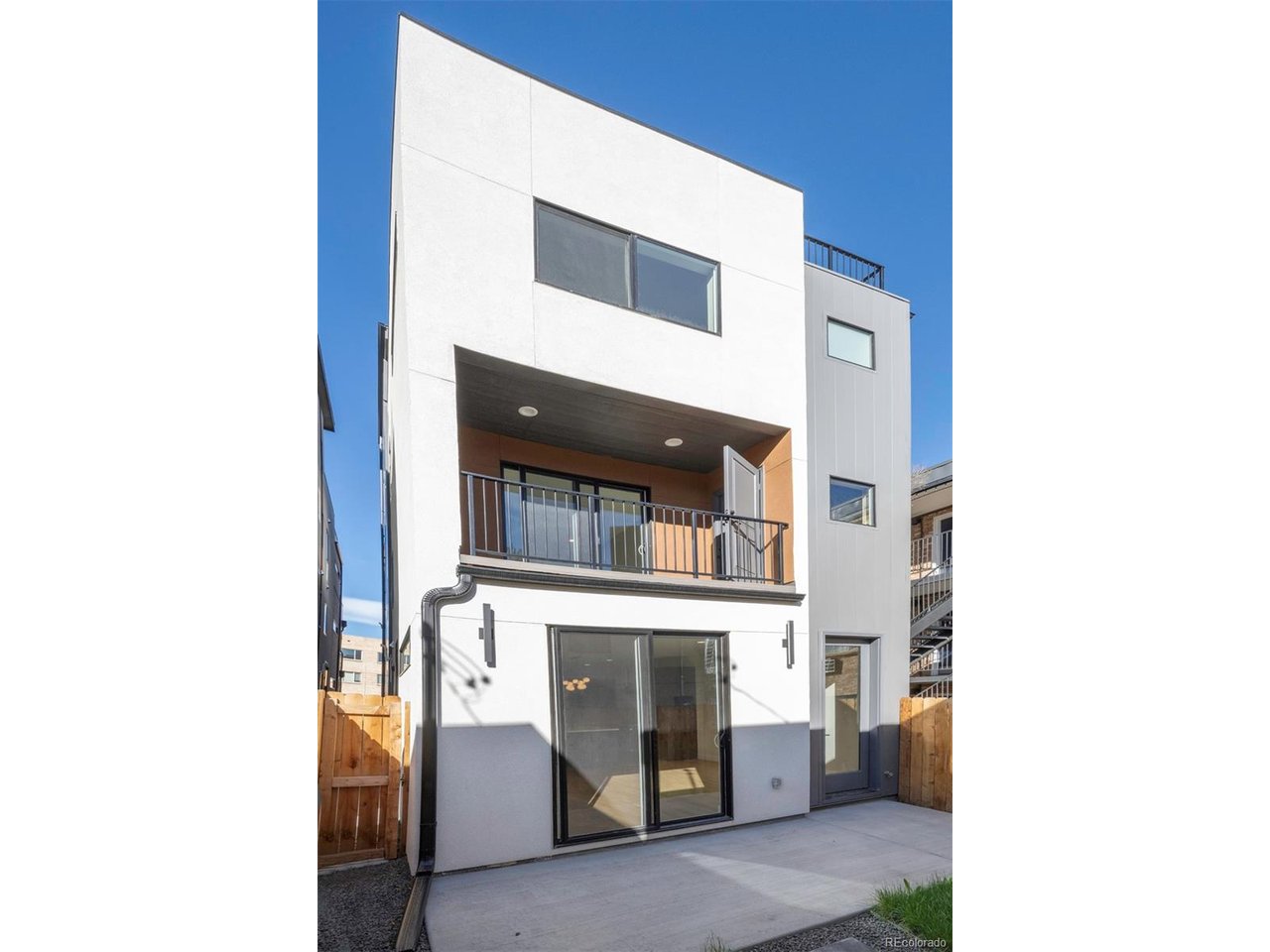 Modern luxury meets unbeatable location in this brand-new 3 bed, 3 bath duplex just two blocks from Denver's 9th & Co development with a rooftop deck. With 1,750 square feet of thoughtfully designed living space, this home offers a rare blend of style, functionality, and low-maintenance comfort-ideal for young professionals, medical staff, or small families.Inside, enjoy an open-concept layout flooded with natural light, a gourmet kitchen with sleek modern finishes, and a full-floor primary suite featuring a spa-inspired bathroom, walk-in closet, and private balcony. The private, fenced yard is perfect for pets, kids, or quiet evenings outdoors, and the detached 1-car garage adds extra convenience. All this with no HOA fees.Located steps from Trader Joe's, Cava, Postino, Frank & Rose Coffee Co., and more, you're minutes from Cherry Creek, Rose Medical Center, and downtown Denver. This is refined city living in one of Denver's most vibrant neighborhoods-schedule your private showing today.