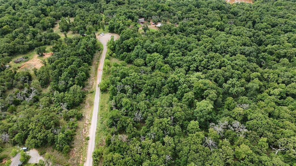 3.56 acres of opportunity just minutes from Lake Thunderbird. This prime homesite in the Colt Addition sits only 3 miles from Harps Grocery, local dining, and outdoor recreation, offering the perfect balance of convenience and quiet country living.OEC electric is available at the road, and access is easy from a peaceful residential area just outside Tecumseh. With no restrictive HOA, you have the freedom to build exactly what you want, whether it is a custom home, barndominium, or weekend retreat.Strong upside in a growing area makes this an excellent option for both end users and investors looking to secure land near one of Oklahoma’s most popular lakes. The adjacent lot to the north is also available and can be purchased together as a package, creating an even larger footprint and added flexibility.