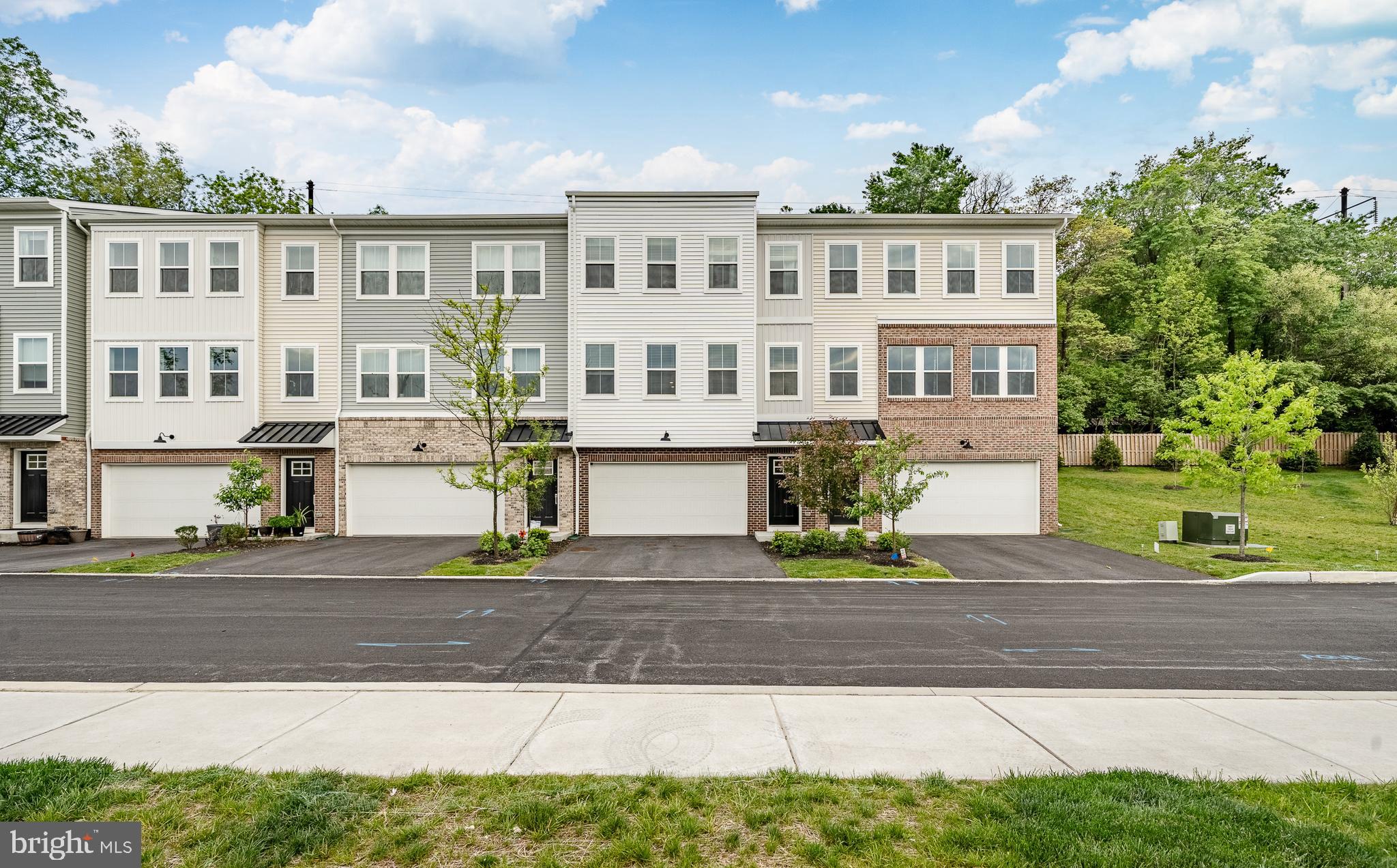 Welcome to 97 Four Leaf Dr, a stunning modern townhome nestled in the highly desirable Clover Mill community in beautiful Downingtown! Built in 2024, this exceptional residence offers the perfect blend of luxury, comfort, and contemporary design with thoughtfully crafted living spaces throughout. Featuring 3 spacious bedrooms, 3 bathrooms, and over 2,000 square feet of elegant living space, this home showcases an open-concept floor plan filled with natural light, high ceilings, and upscale finishes. The gourmet kitchen is a true centerpiece, complete with stylish cabinetry, premium countertops, stainless steel appliances, a large center island, and seamless flow into the dining and living areas — perfect for entertaining or everyday living. The luxurious primary suite offers a peaceful retreat with a spacious walk-in closet and spa-inspired bath. Additional highlights include generously sized secondary bedrooms, modern bathrooms, ample storage, and a beautifully designed layout ideal for today’s lifestyle. Located in the award-winning Downingtown Area School District and close to major highways, shopping, dining, parks, and corporate centers, this move-in-ready home offers both convenience and sophistication in one of Chester County’s most sought-after communities. Don’t miss this incredible opportunity to own a nearly new luxury home in Clover Mill!