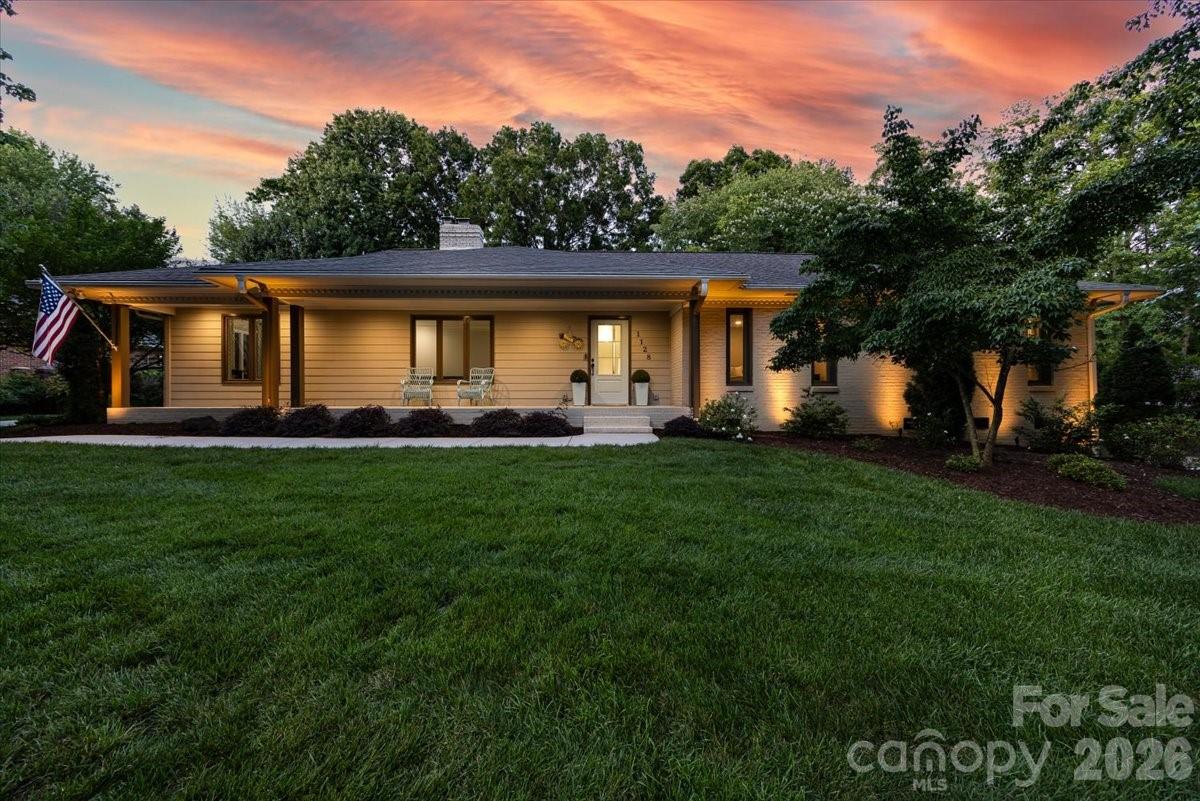 Welcome to this pristine ranch nestled on a gorgeous landscaped lot.  An enlarged front porch creates the perfect welcoming feature, drawing you into the home. Inside, beautifully refinished hardwood floors gleam throughout. The spacious formal living and dining rooms offer elegant entertaining spaces, while the opened-up kitchen flows seamlessly into the family room—perfect for modern living.Updated Kitchen with 42 inch shaker style cabinets, granite countertop and stainless appliances.The wall to the family room was opened and a built in banquet was added. Gas log fireplace and built in bookcases highlight the family room. All bedrooms are a good size. Full bath is large and features two separate vanities...perfect for sharing. Large, primary bedroom features two closets plus a built in chest of drawers. En suite bathroom with shower. Situated on a beautifully manicured lot, the property features a fully irrigated lawn and fenced backyard anchored by a peaceful screened porch. All new windows throughout. This is a really nice property!INTERIOR PHOTOS WILL BE ADDED ON FRIDAY