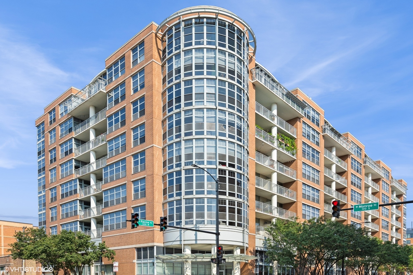 Discover this exquisite 2-bedroom, 2-bathroom condominium in Chicago's vibrant West Loop! Enjoy breathtaking panoramic views of the city skyline from your east-facing balcony. Step inside to find a meticulously maintained interior featuring gleaming engineered hardwood floors that flow seamlessly through the open living areas. The chef-inspired kitchen boasts sleek all-white cabinets, premium stainless steel appliances, a convenient island for meal prep or casual gatherings, a newly built oversized custom pantry, and freshly upgraded quartz countertops for a modern touch. Cozy up by the elegant gas fireplace, accented with a bespoke Ann Sacks glass mosaic surround, or host dinners in the dedicated dining space. Extend your entertaining outdoors onto the expansive balcony, perfect for savoring those iconic vistas. The generous master suite offers a serene retreat with its private bathroom, complete with dual undermount sinks, a luxurious soaking tub, and a separate shower. Custom closets added throughout. The versatile second bedroom, conveniently located near the guest bath, now includes a tailor-made, space-saving Murphy bed that blends functionality with comfort-ideal for guests or a home office setup.  Additional highlights include a full-size stackable washer and dryer, abundant storage options throughout, and fresh neutral tones that create a welcoming, move-in-ready atmosphere. The building enhances your lifestyle with round-the-clock door staff, a well-equipped fitness center, and easy access to major highways and transit routes. Embrace the ultimate walkable neighborhood: stroll to acclaimed Randolph Street and Fulton Market restaurants, nearby Whole Foods and Mariano's markets, trendy coffee spots, and endless urban conveniences. Heated garage parking and full height storage locker included in the price!