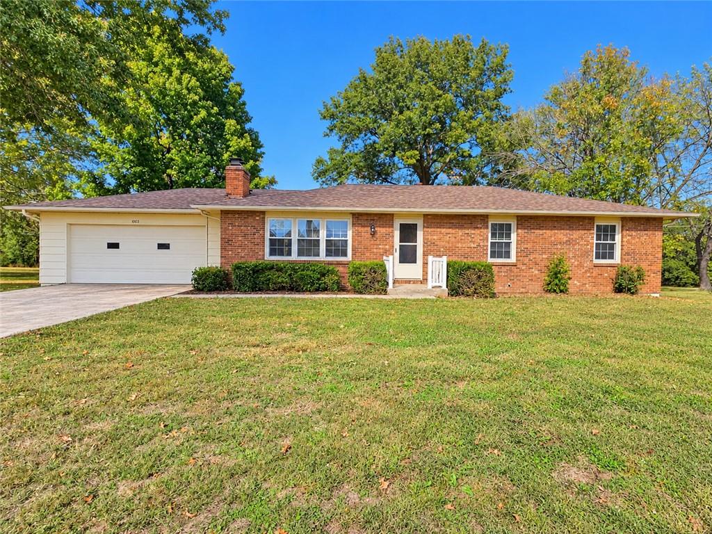 SPACE, POTENTIAL & POSSIBILITIES ON THE SOUTHSIDE OF EL DORADO SPRINGS! Looking for room to spread out and a home you can truly make your own? This spacious 5-bedroom (1 non-conforming), 3-bath home offers approximately 2,800 total square feet with plenty of possibilities! The main level features 1,400 square feet of finished living space, including a welcoming living room with a fireplace insert, a kitchen and dining area with both traditional dining space and convenient sit-at counter seating, 3 bedrooms, and 2 full bathrooms, including a private bath in the primary bedroom. Head downstairs to the walk-out basement, where you'll find an additional 700 square feet of finished living space featuring a cozy family room with a wood-burning fireplace, 2 bedrooms (1 non-conforming), and a full bathroom. The remaining 700 square feet of unfinished basement space was previously used as a workshop and offers endless potential! Bring back the workshop, finish it out for additional living space, or take advantage of the extra storage. Outside, you'll enjoy a back deck overlooking the backyard, a concrete driveway, an attached 2-car garage, and TWO storage sheds measuring 8x12 and 9x12. BONUS! The home also features a NEW ROOF and HVAC system, giving you a great head start on making this property your own! With generous living space, a versatile floor plan, and plenty of opportunity to add your personal touches and updates, this Southside property is ready for its next chapter. Bring your vision and discover the possibilities!