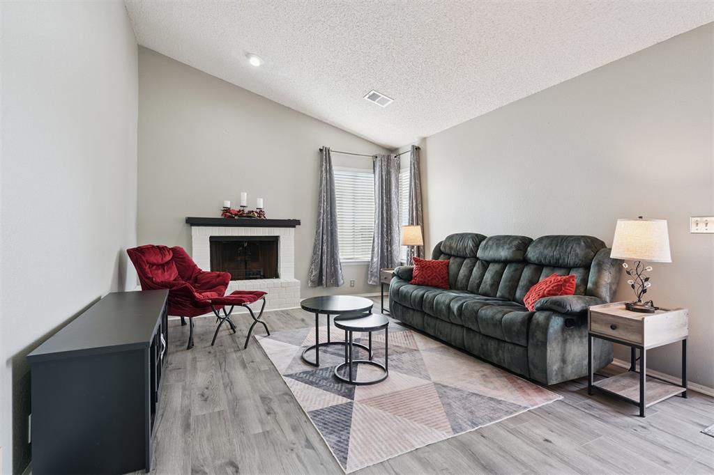 Enjoy this updated, partially furnished townhome in Hefner Village, offering a low-maintenance lifestyle in a highly convenient part of NW OKC.  The front door opens to a cozy living room with a wood-burning fireplace, while around the corner is an open kitchen, a laundry, and a private outdoor patio.  The primary bedroom has an ensuite bathroom, larger closet and ceiling fan, while the secondary bedroom also has a closet and ceiling fan.  A hallway connects the two bedrooms and accesses the secondary bathroom.  There is one covered parking space allotted, along with available additional parking.  Recent improvements include fresh paint in the living room and kitchen, 12 mm water-resistant laminate flooring with a 30-year warranty, two new ceiling fans, a front-door keypad, brushed nickel doorknobs, an electric log fireplace insert, and the option for AT&T Fiber.  The community provides access to one pool.  The location places you minutes from Lake Hefner’s trails, parks, restaurants, a golf course and marina, as well as shopping and dining along NW Expressway, major medical services and retail around the Kilpatrick Turnpike, and the Patience S. Latting Northwest Library.  Nearby Putnam City schools and quick access to OKC attractions further enhance everyday convenience.  This move-in ready home is an excellent opportunity for buyers seeking comfort, value, and amenities in a desirable area of OKC.  Ask your agent for the list of included furniture.  Make this townhome yours and love where you live.