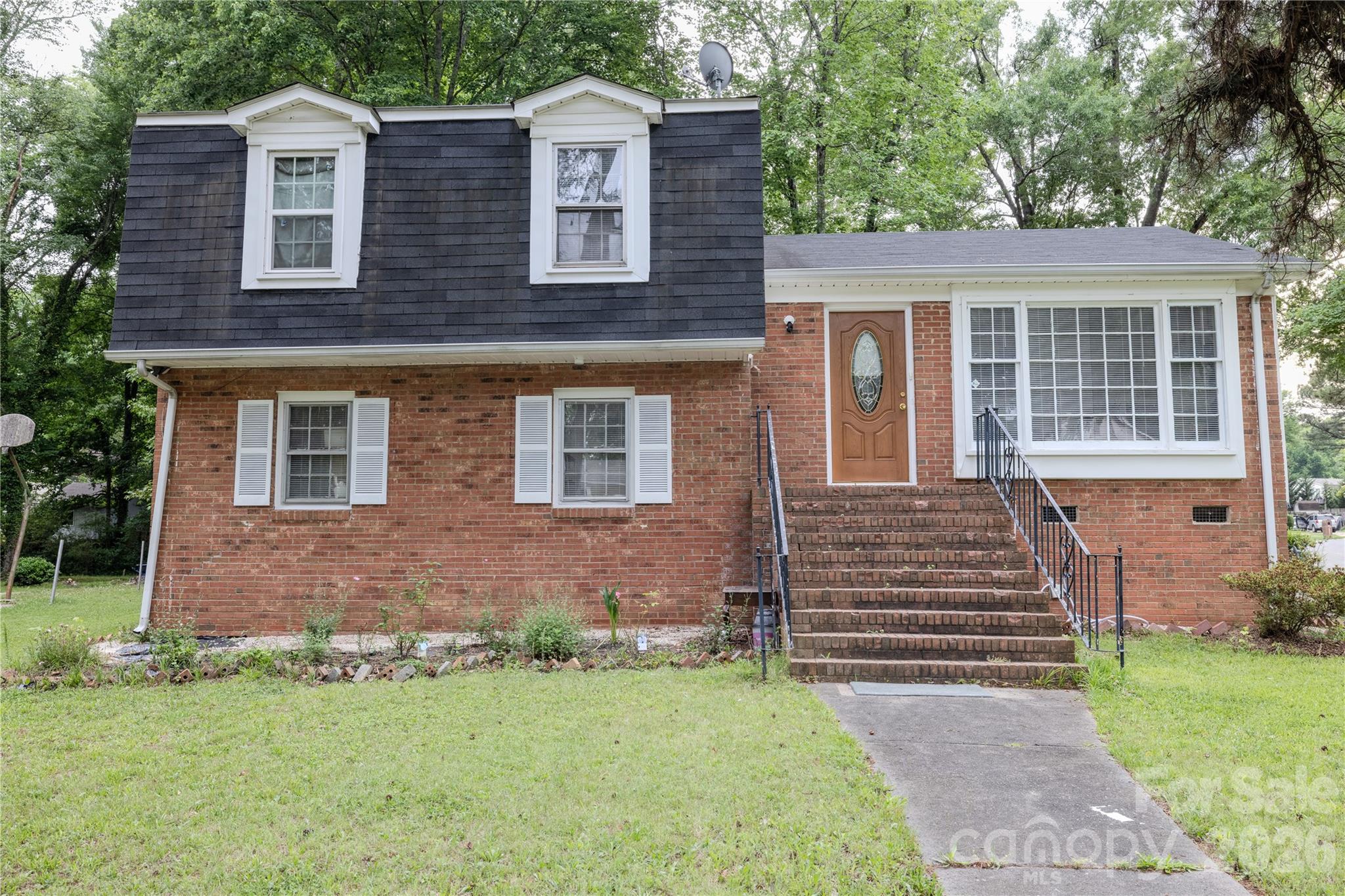 This split-level Charlotte home immediately stands out with fresh paint, updated flooring, stainless steel appliances, updated  kitchen , most of windows updated ,multiple living areas, and a floor plan designed for real-world living.But the real hidden advantage is downstairs.The massive family room with fireplace creates a second living area buyers desperately want right now. Whether it becomes a media room, game room, office setup, or gathering place, it gives this property a competitive edge over homes with limited flexibility.Add in spacious bedrooms, a dedicated laundry room and a convenient Charlotte location, and you have a property positioned perfectly for today’s market.New water heater 2025.Homes that combine space, function, and value move quickly.