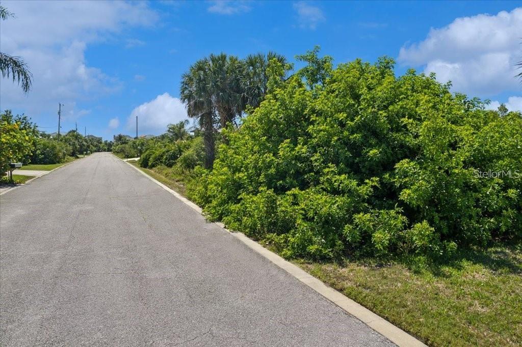Just a few blocks from the sparkling shoreline, this vacant lot is your blank canvas to create the coastal home you've always imagined. Nestled in a peaceful neighborhood with a community pool, this location offers both charm and convenience. Imagine waking up to ocean breezes, sipping your morning coffee on a breezy front porch, or enjoying evening strolls as the sun sets just down the street. Whether you're planning a forever home or a weekend retreat, this lot offers the ideal setting to bring your vision to life. You can choose your own builder and no build time! Start dreaming, start designing, and start building your future right here!