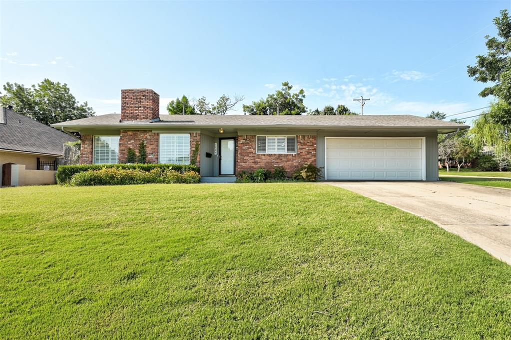 Extremely rare to find anything under $500,000 in Nichols Hills — especially on a street this beautiful, lined with mature trees, lush landscaping, and impeccably cared-for homes.

This mid-century ranch is full of light, character, and room to make it your own. With three bedrooms, three full bathrooms, a large kitchen, a sunny breakfast room, and a formal dining space complete with a vintage wet bar, the layout is both flexible and full of potential.

The living area is anchored by a sculptural stacked-stone fireplace — pure mid-century charm — and plantation shutters accent most of the windows throughout. The primary suite includes double vanities and a walk-in shower, while the secondary bedrooms are thoughtfully situated with private or adjacent full baths.

There’s also a spacious indoor utility room with washer/dryer hookups, a built-in ironing board, an attic fan, and a two-car garage with open-air lattice brickwork and extra storage. The back patio is oversized and ready for entertaining, and the additional green space around the corner of the yard offers room for whatever you dream up next.

A Trane XR HVAC unit, labeled with a manufacture date of November 2023, is already in place — a major plus.

Lovingly maintained, the home is ready for its next chapter. Cosmetic updates will go a long way here — this is a rare chance to renovate in one of Oklahoma City’s most iconic and walkable neighborhoods.