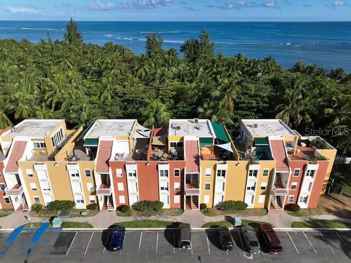 One of the most extraordinary locations in Luquillo is now available, right on the Beach “La Posita.” If you know Luquillo, you know how special it is.  This unique second-floor apartment provides the serene environment your longing for. This private complex of only 36 apartments (two on each floor) is ideal for those seeking to escape the hustle and bustle and reconnect with the Serenity and Blissful Natural surroundings of the Ocean. In addition to direct beach access, the complex provides Gated Entry, 2 assigned and deeded parking spaces, Activities Gazebo & the blessing of being located in one of the best coastal towns on the island. Discover the charm of what awaits you at your new Beachfront Condo. Walking distance to: Restaurants•Shopping•Banks & Town Square.