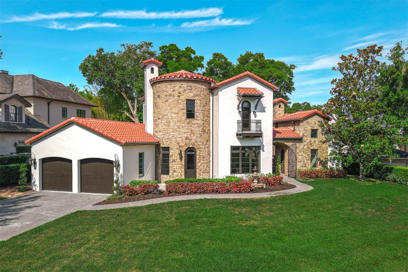 This award-winning Tuscan Mediterranean residence seamlessly blends timeless architecture with a light-filled, open interior, situated on a spacious corner lot just moments from Park Avenue. From the moment you step into the grand foyer—with its graceful circular staircase, custom tile work, and rich wood floors—it's clear that every detail of this home was crafted with care.

The heart of the home is a stunning chef’s island kitchen featuring professional-grade Thermador appliances, custom cabinetry, and granite countertops, all flowing effortlessly into the expansive family room with tranquil views of the private backyard. The main level also boasts a formal dining room, a dedicated office/study, a spacious laundry room, and a serene master retreat offering both privacy and luxury.

Upstairs, you’ll find two oversized bedroom suites and a versatile bonus room, perfect for a media space or playroom. A separate attached guest suite with private entrance offers ideal accommodations for visitors or multi-generational living.

The fully finished lower level includes two large rooms suitable for a home gym, media theater, additional office space, or ample storage.

Outdoor living is just as exquisite, with a covered porch and summer kitchen, a serene pool and spa, and beautifully arranged entertaining areas around a charming outdoor fireplace. Lush, manicured landscaping frames the home, while updated LED lighting, bespoke built-ins, and fine tile finishes enhance every space.

Located in one of Central Florida’s most desirable neighborhoods, this home offers walkable access to the best of Winter Park and Maitland.  Please reach out to schedule a tour to take a look for yourself!

Please see Matterport link for layout of this Beautiful Home.