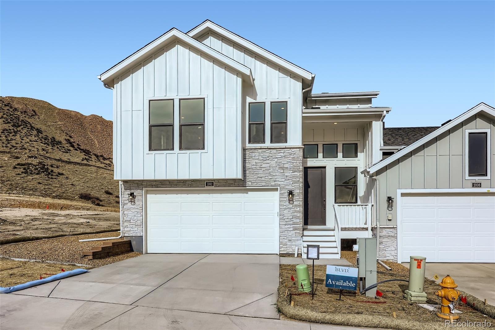 READY NOW!  Brand-New Low-Maintenance Paired Home in Castle Rock! Welcome to The Belford, a beautifully designed patio home that backs to open space and features the stylish Ridgeline exterior. Enjoy a “lock-and-leave” lifestyle in this thoughtfully crafted home located just minutes from downtown Castle Rock, with easy access to shopping, dining, recreation, and medical facilities.  The main level offers 10-ft ceilings with 8-ft interior doors, office, and covered rear deck. Design finishes include Maple cabinetry with dove tail and soft close drawers, tiled kitchen backsplash, KitchenAid appliances with a gas range & French-door refrigerator, quartz countertops with undermount sinks throughout, 12x24-in bath tile, and luxury EVP flooring. Embrace a "lock and leave" lifestyle perfectly nestled on the west side of I-25 located minutes from downtown Castle Rock, shopping, restaurants, recreation, medical and everyday conveniences. Enjoy our exclusive community park including covered pavilion, pickleball & cornhole courts, green space sports field and access to regional walking and biking trails at the Ridgeline Open Space. Explore this boutique new home builder in the Denver Area offering high quality features and Best-In-Class warranties.