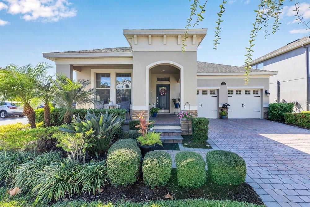 Live the beautiful, low maintenance Florida lifestyle in sought-after Waterleigh! Situated on a premium corner lot, this like new Arbor model offers 4 bedrooms and 3 full baths all on one level with a modern open concept design and impressive upgrades throughout. Enjoy wood look porcelain tile flooring, designer lighting and fans, and stunning floor to ceiling drapes that elevate every space. At the heart of the home is a gourmet kitchen featuring an extended quartz island, pendant lighting, elegant marble backsplash, stainless steel appliances, and a breakfast bar that flows seamlessly into the spacious family room perfect for everyday living and entertaining. The living area also includes a custom upgraded credenza for added style and function. The private primary suite offers generous space, two closets, and a spa like bath with dual vanities and a large walk-in shower. A guest bedroom includes its own en-suite bath and ample closet space, while two additional bedrooms share a nearby full bath. Step outside to your covered, screened lanai an ideal spot to relax and enjoy added privacy overlooking the fenced backyard. Waterleigh residents also enjoy resort style amenities including a private pool with cabana, splashpad, clubhouse, playground, tennis courts, sand volleyball, and open fields. Zoned for newer schools and just minutes to Walt Disney World, top dining, shopping, and area attractions. Don’t miss this exceptional home. Click the virtual tour and schedule your showing today!