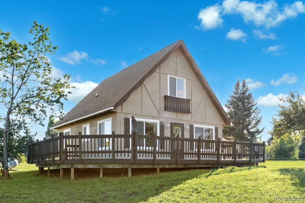 Escape to your own private retreat on 10 beautiful acres with Lake DeCheau waterfront access. Outdoor enthusiasts will appreciate nearby trail access, including the popular M-33 Trailhead, while mature apple, cedar, and birch trees create a peaceful, scenic setting. The home offers comfort and peace of mind with major updates already completed, including a new roof (2017), new furnace (2025), new windows (2025), fresh paint (2025), and new carpet (2025)—making it truly move-in ready. A spacious 2.5-car garage provides ample room for vehicles, tools, and recreational equipment. Whether you’re searching for a year-round residence or a seasonal getaway, this property offers the perfect balance of privacy, nature, and Northern Michigan living in the heart of the Elk Capital.