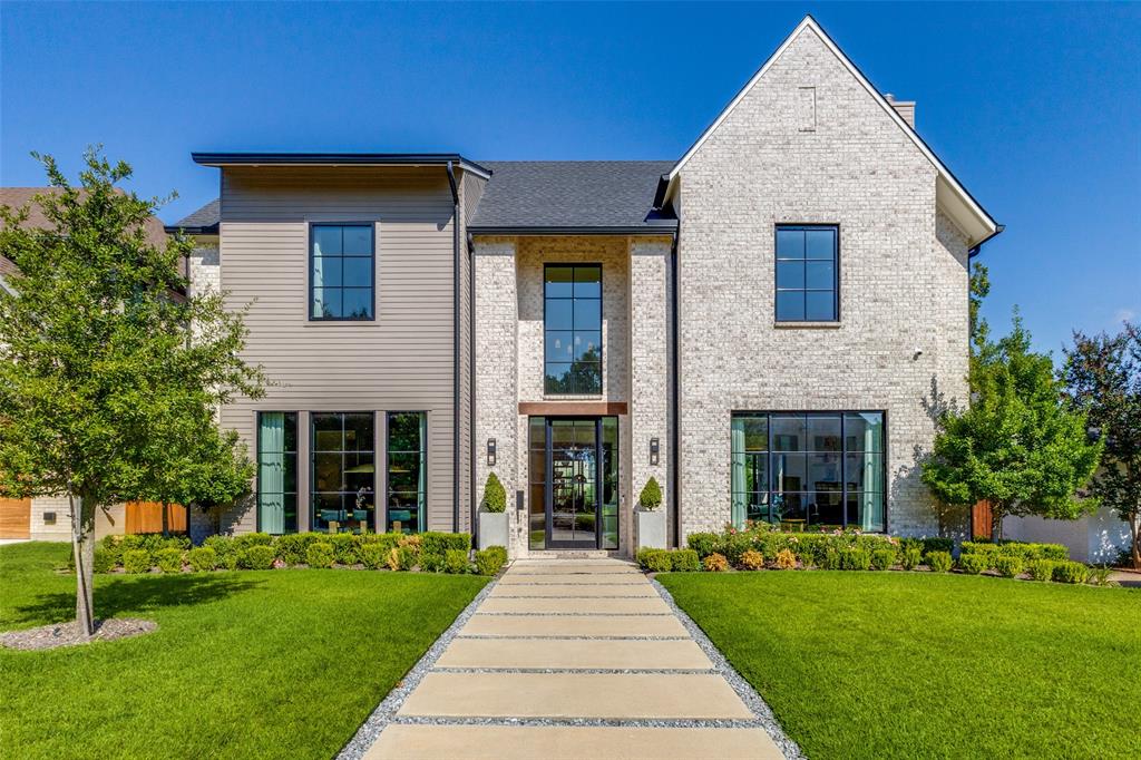 Built in 2021 by Fairmont Homes, this residence blends modern sophistication with enduring style. Nestled on a prime block in Lakewood, just minutes from White Rock Lake and Lakewood Park, this 5-bedroom, 5-bath property delivers an exceptional layout with refined details throughout. The bold architectural design enhances curb appeal and welcomes abundant sunlight inside. Interiors showcase curated elegance with smooth museum walls, tailored plaster accents, soaring vaulted ceilings, and stunning white oak hardwoods. The kitchen was thoughtfully designed for culinary enthusiasts, highlighted by a premium Thermador suite and a dramatic marble-clad range hood. Custom rift-cut oak cabinetry elevates both function and beauty. Outdoors, enjoy a fully appointed kitchen, sparkling pool, heated spa, and a generous turf lawn for relaxation and play. A downstairs bedroom with a Murphy bed serves perfectly as a guest retreat or private office. Upstairs includes a versatile game room and spacious secondary bedrooms, each with stylish en-suite baths and expansive walk-in closets. The serene primary suite provides a spa-like retreat and an oversized closet designed to impress. Every space reflects intentional design, unparalleled comfort, and exquisite craftsmanship. This extraordinary Lakewood home is ideal for those seeking both luxury living and everyday ease—an opportunity not to be missed in one of the neighborhood’s most desirable areas.