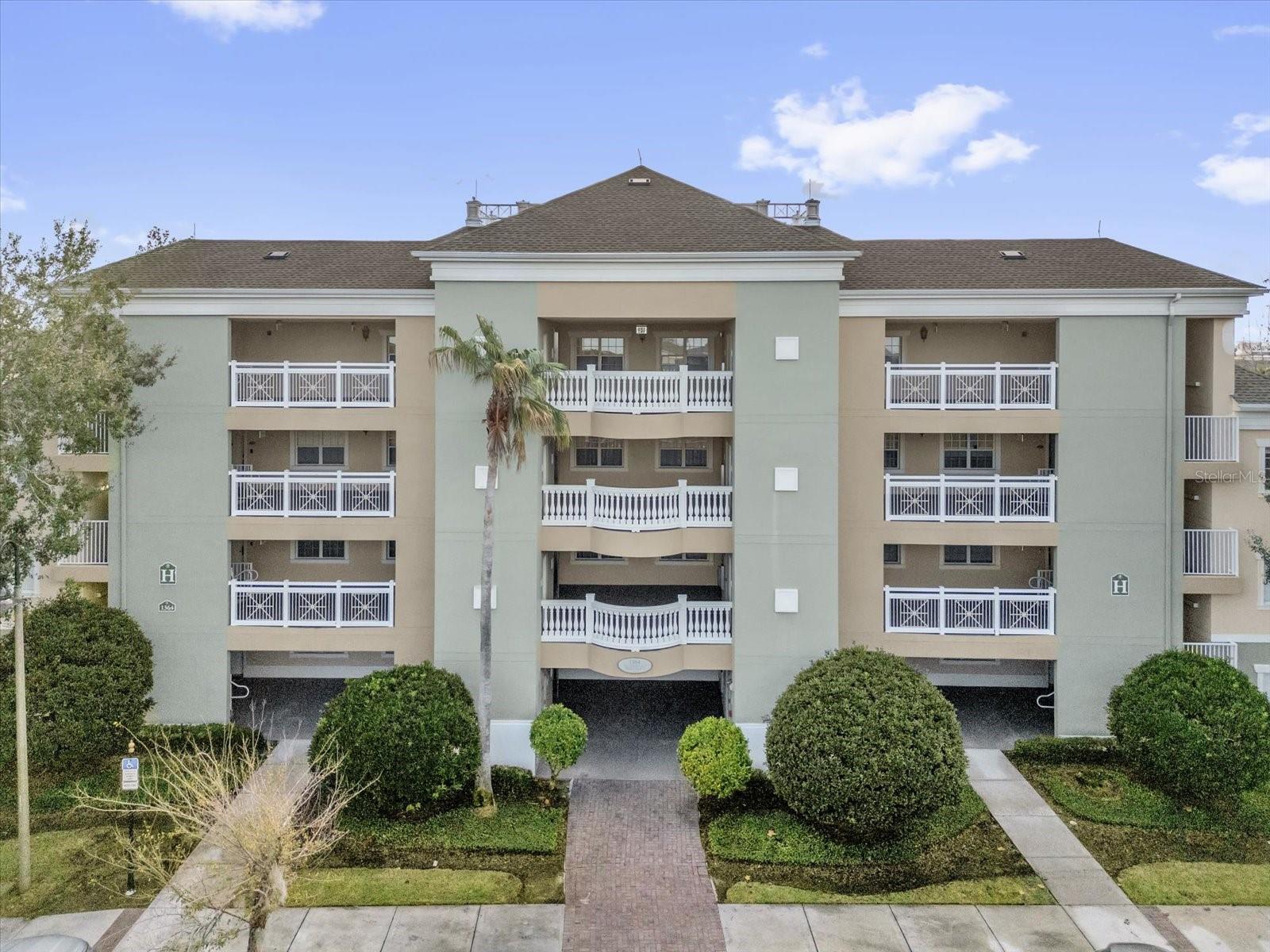 ACTIVE RESORT MEMBERSHIP AVAILABLE. Your search is over.  Whether you are looking for full time residence or short term investment, this stunning first floor condo is located in the highly sought-after community, Reunion Resort.  Located on a par 3 hole and steps away from the community tennis, pickleball, and mini golf course. This condo offers 3 bedrooms and 3 full  baths. As you step inside, you'll be greeted by an open and spacious floor plan that's perfect for entertaining and relaxation. The living room is bright and airy, with large windows that allow plenty of natural light to flood the space. The kitchen is fully equipped with stainless steel appliances, granite countertops, and a breakfast bar, making meal prep a breeze. The generously sized master suite is a true oasis, complete with two walk-in closet and a spa-like ensuite bathroom. The remaining bedrooms are spacious and comfortable.  Enjoy the Florida weather from your private patio or soak up some sun at the 14 community pools. Paradise is calling - make it yours today!   Yard maintenance, cable, internet, and water and sewer are included in your monthly HOA payment. Schedule your private showing today!  Call today to see this spectacular home being a short distance to all of the major theme parks. Reunion Resort Members take advantage of the 3 signature golf courses, tennis center, state of the art water park with lazy river, 11 community pools, 5 restaurant areas, playground, organized activities and so much more. The resorts proximity to all of the major theme parks, especially Disney World being just 6 miles away, makes this vacation community a top choice for visitors of all ages.