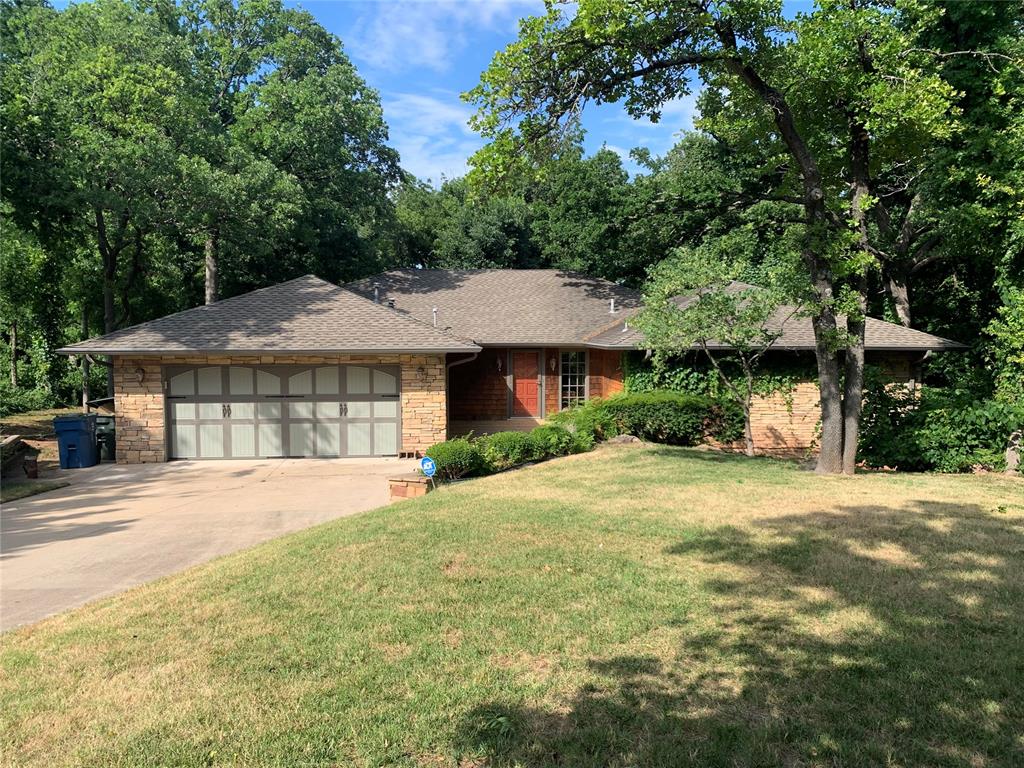 Unique opportunity on a great rolling wooded lot.  Large kitchen and family room, isolated master suite featuring a large walk in closet , storm shelter...  The park-like setting features a dry creek and lots of trees to go along with award winning schools on this in town acreage!!!  Don't miss this great opportunity to put your personal stamp on this beauty!!