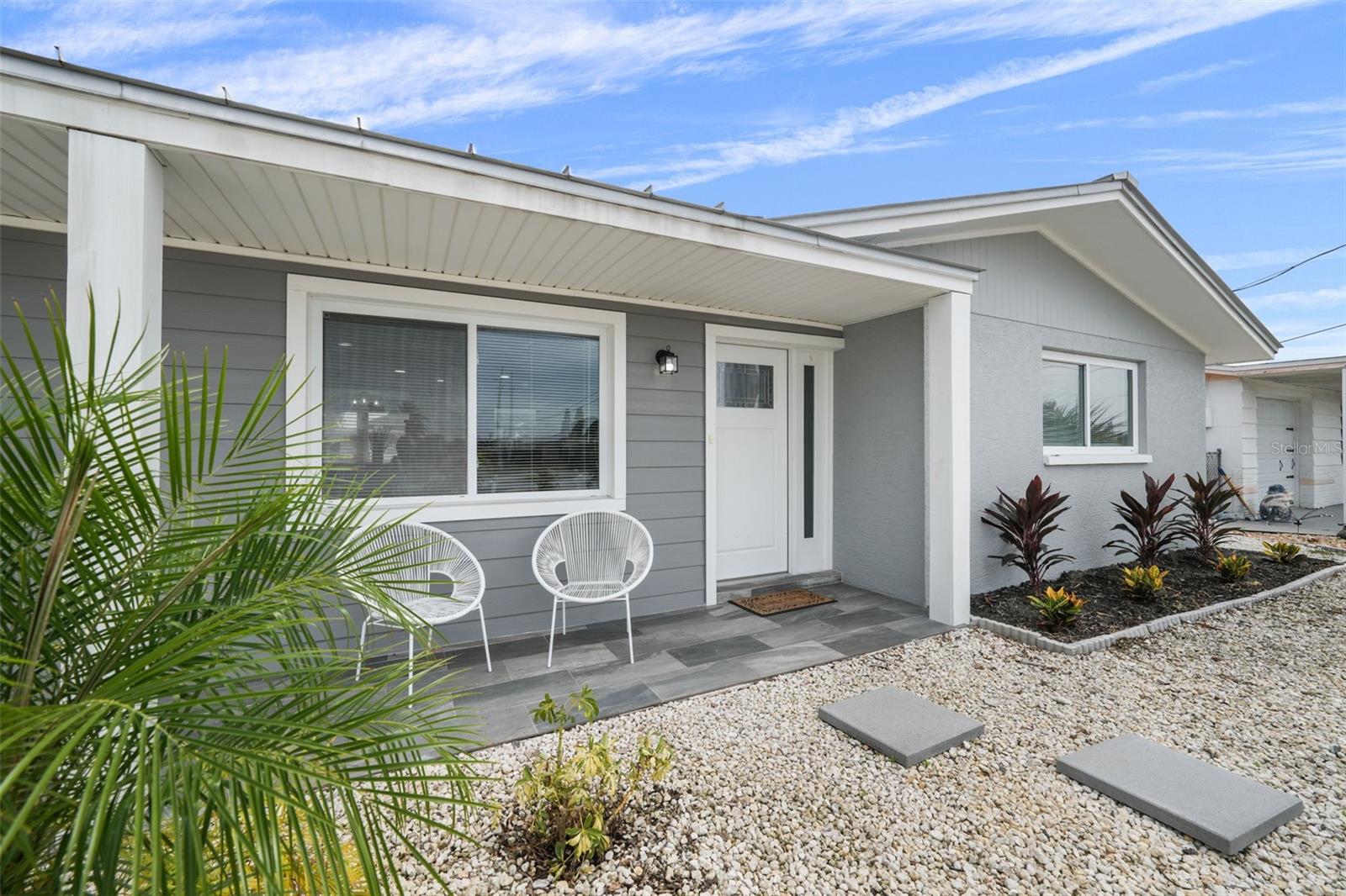 Fall in love with the vibrant Key West vibe and laid-back lifestyle of Hudson Beach in this FULLY REMODELED 2-bedroom, 1.5-bath waterfront Home! From top to bottom, this home showcases fine finishes, designer tile work, and an open-concept layout that maximizes space and comfort. A flexible formal dining area offers stunning water views and could easily serve as a second family room, home office, or bonus space. METAL ROOF & INSULATED BACK PORCH OVERHANG, NEWER WINDOWS & DOORS all put the mind at ease and LOW ELECTRIC BILLS! FURNITURE INCLUDED FOR THIS GREAT PRICE, along with Linens, Stocked Kitchen and more!!

Enjoy the convenience of an indoor laundry room with a combo half-bath and built-in storage. The brand-new appliances (all under warranty!) and thoughtfully designed kitchen make everyday living a breeze.

Step into your tropical backyard retreat, complete with low-maintenance faux turf, a stylish cabana with a built-in bar, and space for an outdoor kitchen—ideal for entertaining or relaxing by the canal. Kayak racks are ready to go, and there’s plenty of room for all your water toys. A deep-water canal just steps from your door gives you quick, direct Gulf access in only 4 minutes—perfect for boating, fishing, or chasing tarpon and mackerel in the shallows. The double-wide driveway and extra parking mean there’s space for your boat trailer, golf cart, or guests. Inside the garage, you'll find a new hot water heater and ample storage solutions. Located in a golf cart–friendly community with a local beach, marina, community center, and regular golf cart parades, Hudson Beach offers an unbeatable small-town coastal experience. Enjoy waterfront dining, live music, and the #1-rated ice cream shop—all just around the corner.  Whether you’re looking for a vacation getaway, a primary residence, or a high-performing investment property, this hidden gem is your ticket to Florida’s Gulf Coast paradise. ALL NEW APPLIANCES (still under warranty), NEW TILE FLOORING, New CABINETS & VANITIES, NEW WI FI Garage Door, NEW FURNITURE (INCLUDED), and more.... Club Car Golf Cart can be included with sale for agreed upon Sale Price.
