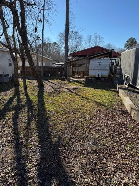 New Listing lot available small camper can be moved off of no value but gives you room to put your camper in place, county water available, 35x79x42x74 Per County Records.  Very quiet area get started now and have ready before spring so you can just come and have fun this summer no work will be needed by then.