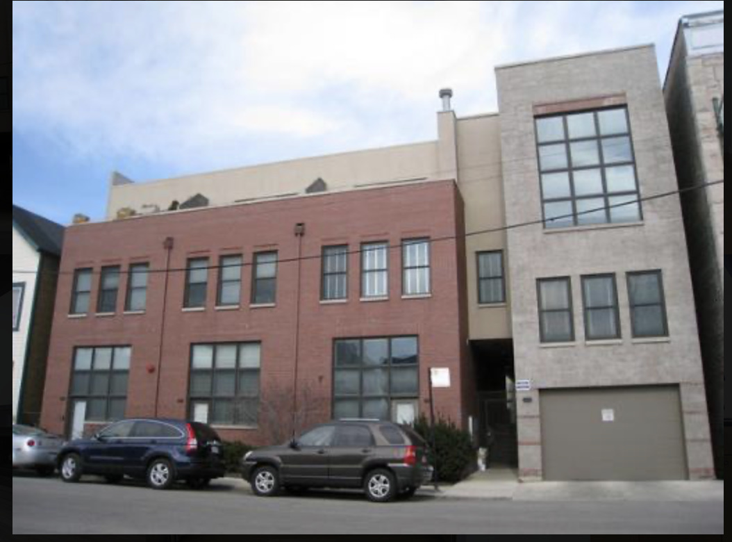 Bright Corner Townhome Duplex with 2 Heated Garage Spots!  Set back off Clybourn in a quiet courtyard setting, this sun-filled duplex offers a spacious living room with custom built-ins, gas fireplace, and dining area. The kitchen features stainless steel appliances, granite countertops, and a breakfast bar. Upstairs, the split floor plan includes a primary suite with walk-in closet and a Jacuzzi bathtub, separate shower, and double vanity. The  oversized second bedroom also has a walk-in closet. Recent updates include a remodeled bath, new hardwood floors, carpet, windows, HVAC, and appliances. Private patio ideal for grilling, all in a prime location close to shopping, dining, and transit.