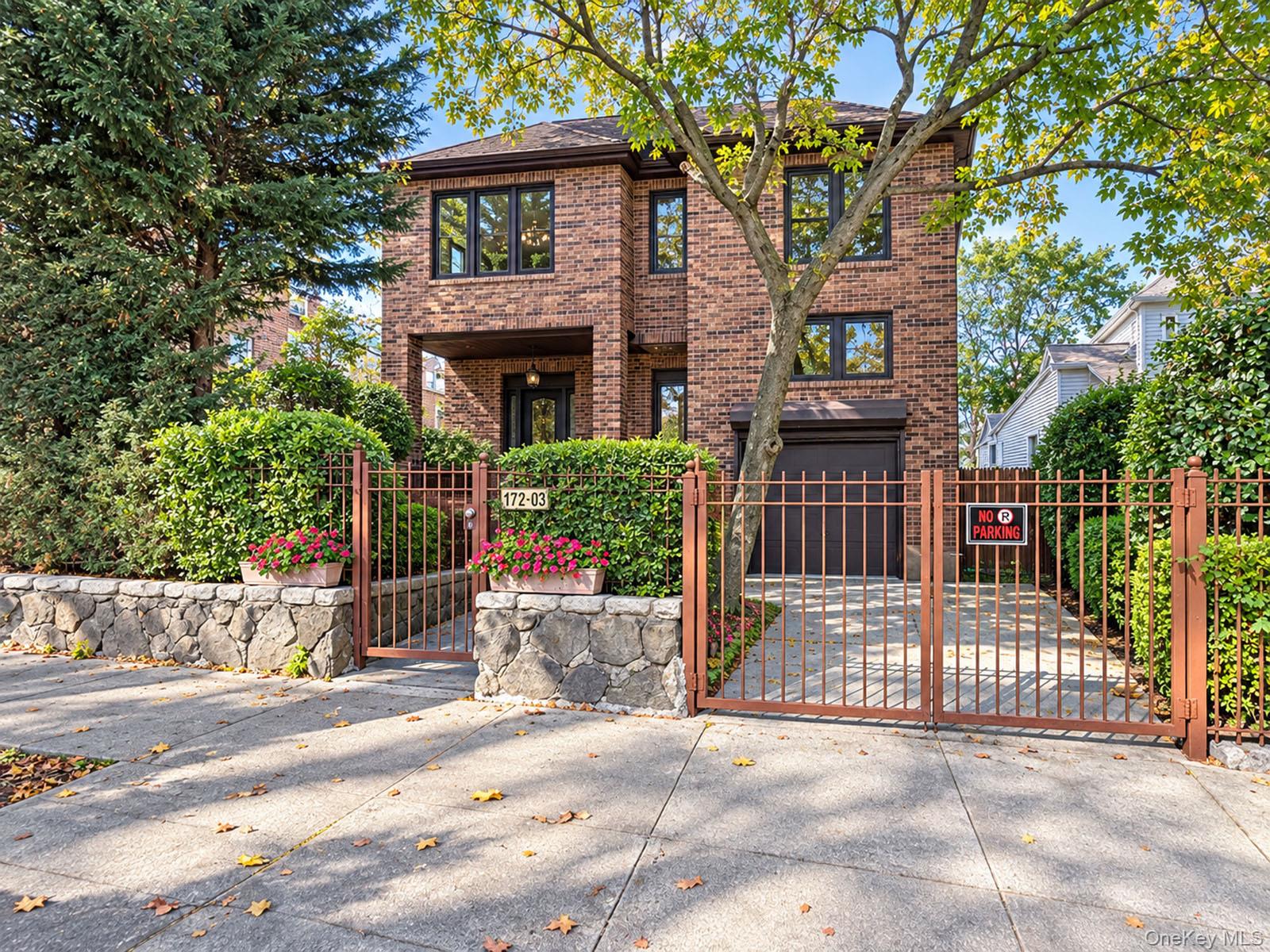 Located in North Flushing, this custom-built, all-brick detached home was constructed in 2004 and has been well maintained. Offering approximately 4,760 square feet of interior space on a 55 × 100-foot corner lot, its six-level split-level layout provides generous living space, privacy, and flexibility.The impressive Great Room features a soaring ceiling, fireplace, professional pool table, and custom bar—ideal for relaxing or entertaining. The fourth level is dedicated to a private primary suite with its own balcony and large whirlpool tub. A bright upper-level attic offers flexible space for a home office or other uses.The home features central air conditioning, an all-brick exterior, and a brick-and-stone perimeter wall. The finished lower level includes a dedicated laundry area, a half bath, and separate entrances leading to the front and rear of the property.Situated at the corner of 35th Avenue and 172nd Street, the property is conveniently located near local shops and public transportation. Based on the information provided, it is within Queens School District 25, serving PS 32 and IS 25.This distinctive North Flushing residence combines custom construction, spacious living, and a convenient location.