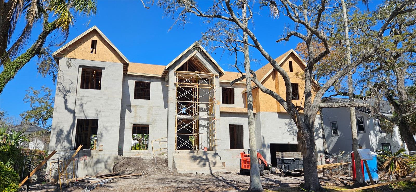 Pre-Construction. To be built. Introducing an ultra-rare new luxury residence situated in the highly coveted Beach Park Isles neighborhood on an oversized 100x120’ lot by Baywalk Custom Homes. This two-story, all-block construction estate will offer approximately 6,200 square feet of living space with 5 bedrooms, 6 full baths, and a 4-car tandem garage, along with a resort-style pool, spa, and outdoor kitchen. Estimated completion: Winter 2026. Step through the grand foyer into a spacious open-concept living area centered around a gas-burning fireplace and a chef’s kitchen equipped with a professional Thermador appliance suite. Premium design elements include 42” upper cabinets with under-cabinet lighting, marble countertops, a large center island with bar seating, and a casual dining nook overlooking the lanai, pool, and spa. The first floor also features a formal dining room, den, mudroom, game room, and a generously sized guest suite with a full bath and walk-in closet—ideal as a second primary suite for visiting family or friends. Upstairs, the expansive primary suite includes a private sitting area, spa-style bath, and huge walk-in closet. The upper level also offers three additional bedrooms, a gym/bonus room, and a second laundry room for added convenience. All bedrooms feature custom closet systems. Outside, the backyard oasis showcases a covered lanai with tongue-and-groove ceiling and travertine flooring, a fully equipped outdoor kitchen, saltwater pool and spa, and a professionally landscaped, fenced yard.