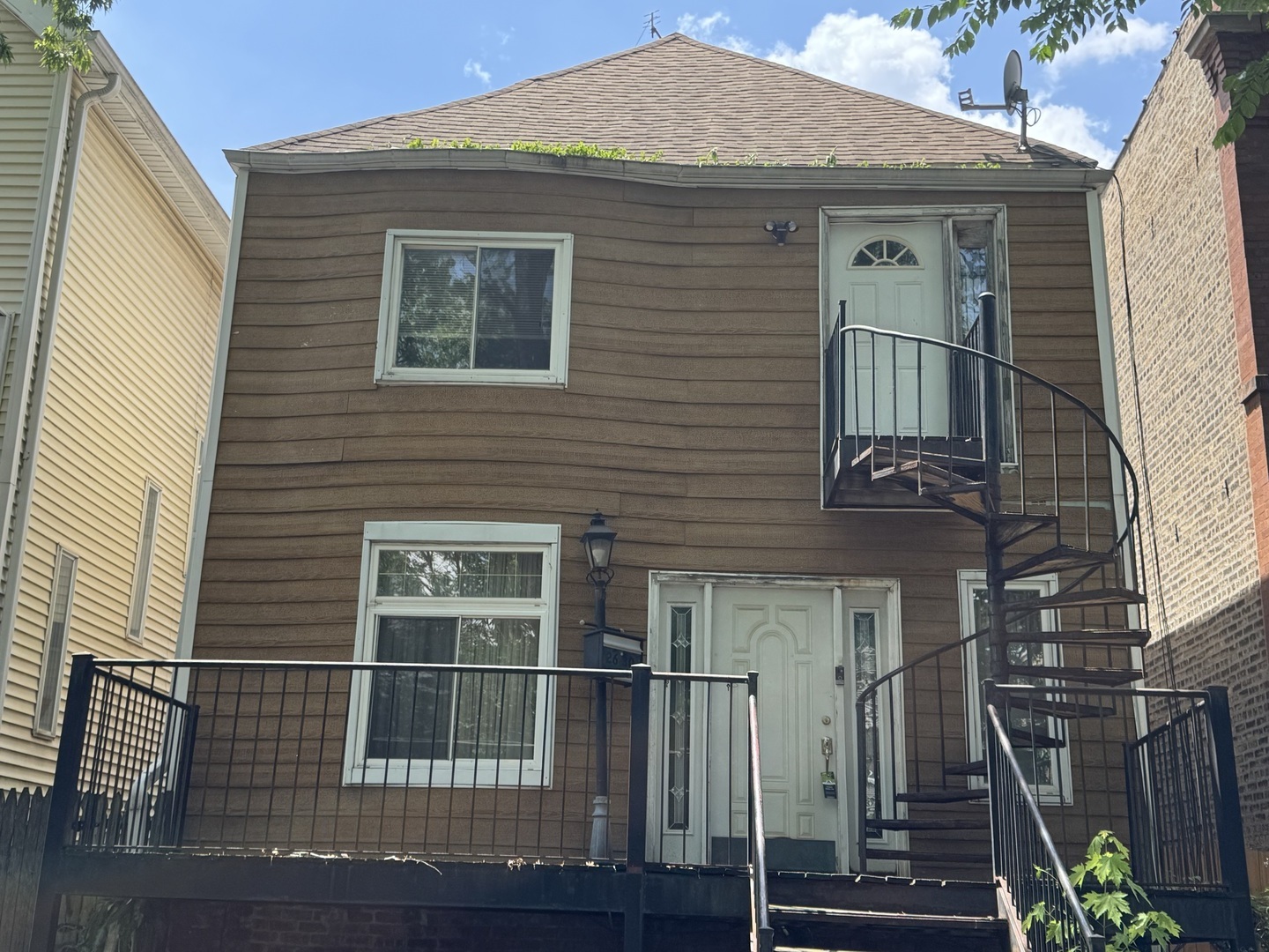 Great opportunity to own a 2 Stories Single Home in a prime investment Chicago area. Whether you're a seasoned investor looking to expand your portfolio or a newcomer to real estate investment, this property is a promising choice. Great site for tear down and new development construction situated in an excellent location with lots of new constructions and new developments all around. The first floor has 2 Brs. and 2 full baths, hardwood floors in the living room and dining room. The kitchen has table space. The second floor features a 2nd kitchen, 2 bedrooms, 1 full bath and front and rear entrances. The basement is partially finished with a recreation room and plumbing for a bath. This home is in good condition, but it needs updating and TLC. The property is being "Sold As-Is", with no repairs or updates to be made by the seller.