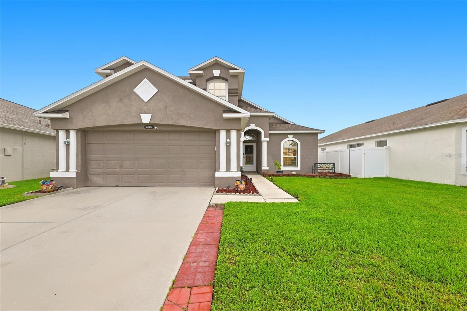 Welcome to Summer Lakes! This highly sought after community is home to this stunning two story residence, where soaring ceilings, abundant natural light, and an open concept design create an inviting atmosphere from the moment you enter. The spacious kitchen flows seamlessly into the dining and great room, making everyday living and entertaining family and friends effortless. The first floor primary suite offers a peaceful retreat with a private en-suite bath and walk-in closet. Upstairs, a versatile loft overlooks the great room and provides additional living space, while two generously sized bedrooms and bathroom offer plenty of room for family and guests. Both secondary bedrooms feature charming window seats perfect for reading, relaxing, or a child's favorite hideaway. Step outside and discover your own private backyard oasis! The covered patio features a bar and mini refrigerator, creating the perfect setting for outdoor entertaining. Take a dip in the sparkling pool, complete with a new water filter and pool pump, as well as a child safety fence. The low maintenance backyard is beautifully finished with artificial turf for year round greenery, a vinyl privacy fence, and a serene pond view. This home has been thoughtfully updated with an HVAC system, new ductwork, refrigerator, microwave, range, and water heater all replaced approximately two years ago. The roof was replaced five years ago. Additional features include a generator electric port, tinted windows, and overhead garage storage, adding convenience and functionality. Ideally located near dining, shopping, golf courses, and world class beaches, this gem offers the perfect blend of comfort, style, outdoor living, and convenience. You won't want to miss this one!