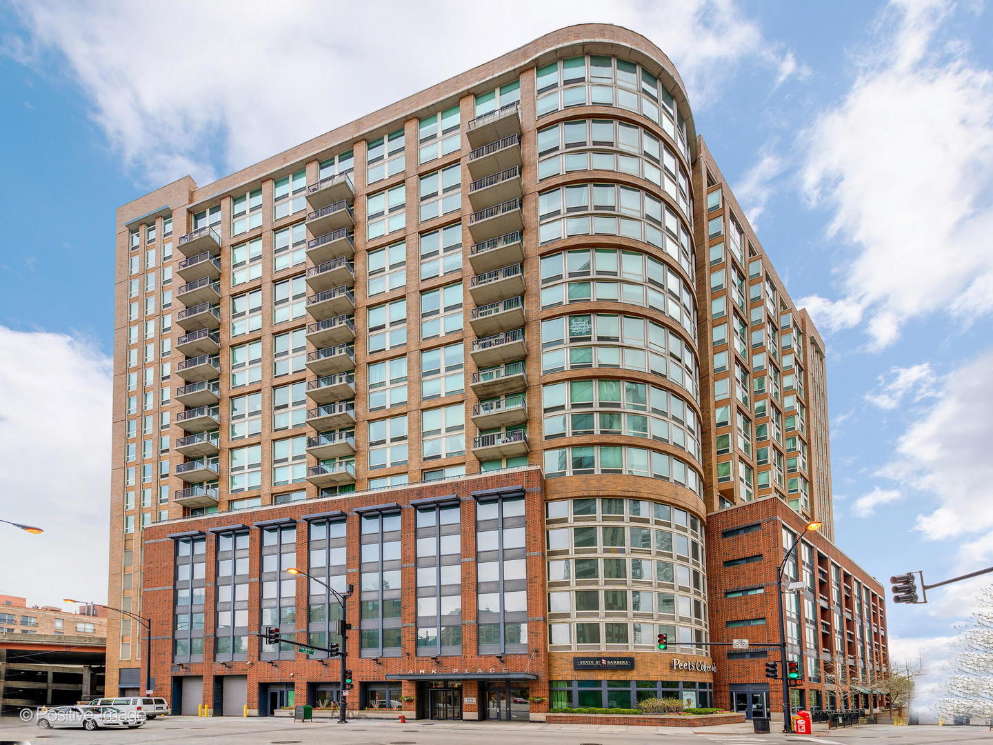Unobstructed park views and sophisticated style define this stunning end-unit duplex-up in the heart of River North! This contemporary 3-bedroom + den, 2.5-bath residence lives like a single-family home and showcases designer finishes throughout. Thoughtfully reimagined from top to bottom in a full recent renovation, the home boasts over $175K in custom upgrades. The main level's dramatic living space features soaring 20-foot floor-to-ceiling windows that frame incredible, completely unobstructed views of Ward Park, the river, and lush treetops. The open 2,000-square-foot layout is ideal for entertaining, highlighted by a chef's kitchen with Sub-Zero refrigerator, Wolf cooktop and oven, a floating vented hood, full-height quartz backsplash, and a 6-foot waterfall island. A custom bar area with wine fridge and abundant storage adds the perfect touch for gatherings. Upstairs, two spacious bedroom suites include a primary retreat with an attached den/exercise area, two large custom closets, and a spa-quality bath with a walk-in rain shower and floating dual vanities. Every detail exudes luxury, from the Italian cabinetry and new wide plank white oak hardwood floors through out to the Porcelanosa tile, custom lighting, and motorized shades. Enjoy two private balconies (one on each level) and take in sweeping park and river views from every room, truly a rare end-unit perspective unlike any other. Garage parking on the same floor is available for an additional $35,000. This full-amenity building offers a 24-hour door staff, pool, fitness center, and on-site management. Perfectly located near East Bank Club, top restaurants, nightlife, the dog park, and the riverwalk, this is River North living at its absolute best.