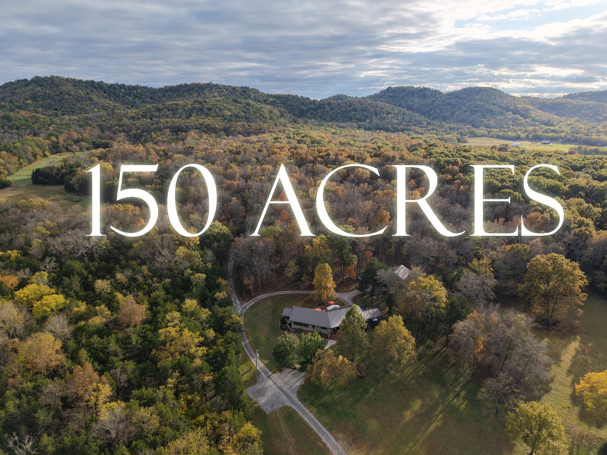 Discover one of Middle Tennessee’s most private retreats—155 +/- stunning acres featuring a custom Frank Lloyd Wright inspired home, guest house, additional build sites, exceptional equestrian facilities, and unmatched natural beauty.

Just 35–45 minutes from Nashville, this estate is perfectly suited as a family compound, corporate retreat, or private getaway. The property includes multiple additional build sites, one of which is a very large 5 br soil site marked and surveyed for additional home(s). The 3,050 sq ft main residence is crafted in Western Red Cedar, offers 3 bedrooms and 3 en-suite baths, all with bespoke upgrades, and features a screen room and over 1000 feet of Trex deck. A separate Western Red Cedar 982 sq. ft. 1 bedroom and 1 bath guest house mirrors the same quality of the main house with granite counters, tankless hot water, hardwood floors, tiled laundry and bath. Equestrian enthusiasts will appreciate the custom horse barn with six 12x12 stalls, hot water wash rack and room for 8 more stalls as well as an office featuring air conditioning/heat, tankless hot water heater, granite counters, custom built ins, wine refrigerator, chandelier lighting, well water and RV hookup. The property also boasts a 130x200 all-weather riding arena, rolling pastures, and wooded trails. 

With house, guest house, multiple outbuildings and dedicated soils sites providing flexibility for additional residences, this is an unparalleled opportunity in Middle Tennessee. Completely tucked away from the bustle, yet close to modern conveniences, this estate blends comfort, functionality, complete privacy and natural beauty. The prospective buyer will be holding first right of refusal to the farm equipment.  ** September 2025- New 40 year roof for both main house and guest house.