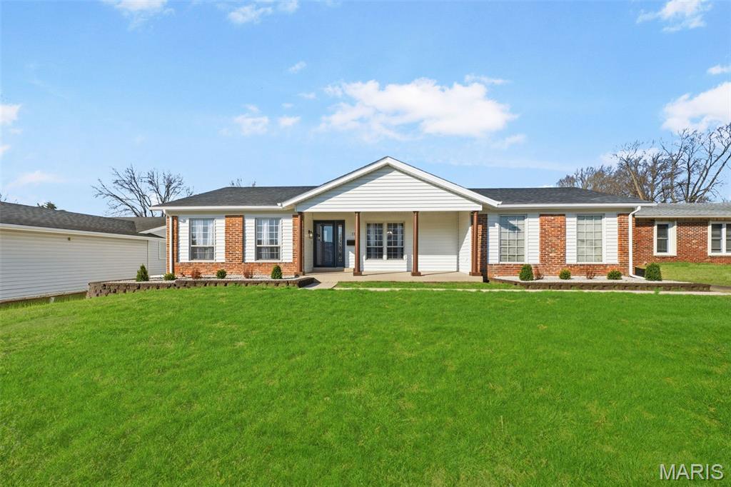 THE CROWN JEWEL OF THE NEIGHBORHOOD! THE WAIT IS OVER! Prepare to be captivated by this sprawling 5-bedroom, 3-full-bath masterpiece—unquestionably one of the largest and most meticulously designed homes in the entire subdivision. This isn't just "move-in ready"; it is a turnkey sanctuary with unlimited potential. From the moment you step into the inviting foyer to find a seamless flow between the formal living and dining rooms, anchored by original hardwood floors that have been expertly refinished to a lustrous glow. The heart of the home is a designer kitchen curated for the culinary enthusiast, featuring an exquisite Taj Mahal backsplash, new cabinetry, a custom range hood, and elegant countertops—all complemented by a practical kitchen peninsula. The suite of brand-new, energy-efficient SS appliances includes a stylish, integrated microwave drawer. The adjacent family room offers a grand yet cozy atmosphere, centered by a custom limewashed wood-burning fireplace that leads directly to your private outdoor oasis: a massive, well-maintained Trex deck built for effortless entertaining. The primary en-suite is a true departure from the everyday, offering expansive square footage and the luxury of two separate walk-in closets. THE ULTIMATE FLEX SPACE: The lower level is a total game-changer, boasting an additional 1,500+ square feet that serves as a "home within a home." Featuring a third full bathroom and a second kitchen, this massive space offers endless possibilities. Whether you need a spacious in-law suite, a home office, a private gym, or a source of rental income—the choice is yours! TOTAL PEACE OF MIND: Rest easy knowing every major system is BRAND NEW, including the roof, water heater, AC unit and furnace is high-efficiency with a 10-year warranty. From the finishes to the incredible multi-generational layout, this home offers a rare combination of style and substance. Don’t wait and miss your opportunity to own such an amazing property! Schedule your private tour today—this one won't last!