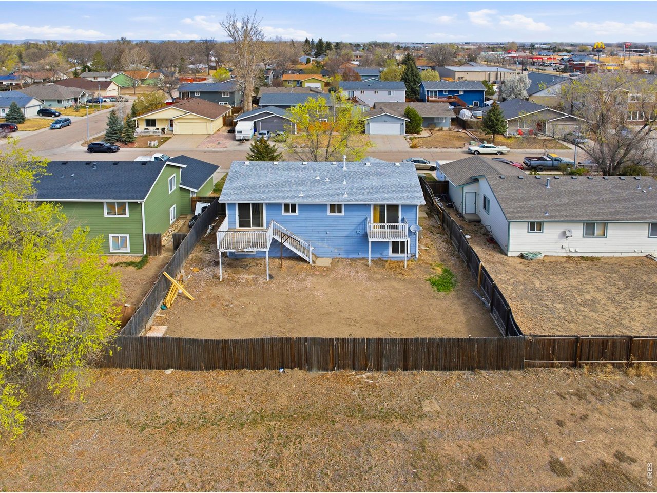 Opportunity knocks for the savvy buyer ready to build instant sweat equity. This light-filled home features an open floor plan with vaulted ceilings, a spacious primary suite with a five-piece bath, and generous living areas on both levels. Backing to a one-acre vacant lot, it offers added privacy and room to breathe. With 2,335 sq ft, 4 bedrooms, and 3 baths, it's primed for a cosmetic refresh and priced accordingly. Sold as-is.