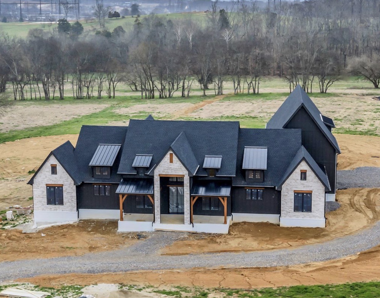 A masterpiece in the making—this extraordinary estate redefines luxury living on 9 pristine acres, offering more than 9,900 sq ft of custom-designed perfection. Crafted with an uncompromising eye for detail by This Blue Home Designer Vicky Blue and masterfully built by Alpine Construction Group LLC, this residence is destined to be one of the area’s most iconic homes.From the moment you enter, the home reveals its grandeur: soaring ceilings, All-Clad windows framing sweeping views, and a gourmet culinary space outfitted with custom cabinetry, Wolf & Sub-Zero appliances, and the finest designer finishes. Every inch exudes sophistication.The home is elevated by a fully integrated Lutron smart-home system, an immersive entertainment package, and thoughtful conveniences including three fireplaces and two laundry rooms. The walkout basement features a complete second kitchen—ideal for generational living, extended guests, or elevated entertaining.Outside, the magic continues. Pool renderings included in the media unveil a show-stopping resort environment—your own private escape—complete with a dramatic waterfall and exceptional outdoor living spaces designed for unforgettable gatherings.Every space has been curated, every detail intentional. Design boards coming soon, with a window of opportunity to add your personal touch before completion.Homes of this caliber are seldom offered. This is more than a residence—it’s a legacy property.Inquire today for full details or to experience the vision firsthand.