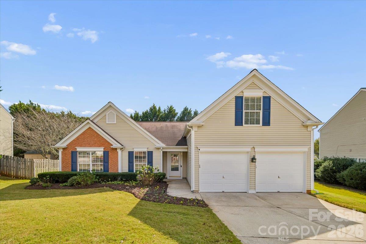 Bright, inviting, and thoughtfully designed, this home offers an open floor plan with vaulted ceilings, beautiful natural light, and comfortable living spaces throughout. Fresh paint, new recessed kitchen lighting, and updated light fixtures in the great room, dining room, primary bedroom, and baths give the interior a refreshed feel. The kitchen features abundant cabinetry, generous counter space, and a breakfast bar overlooking the adjoining living areas, creating an easy flow for everyday living and entertaining. The great room is anchored by a cozy gas fireplace, while the spacious primary suite offers a walk-in closet and an ensuite bath with dual vanities, a soaking tub, and a separate shower. Three bedrooms are conveniently located on the main level, with an additional upstairs bonus room offering flexibility for a home office, media room, or recreation space. The sunroom extends the living area and features its own mini-split system, for climate controlled comfort throughout the seasons. Sunroom is fully permitted with an additional heated square footage of 205 sq ft, on top of the overall square footage of 1,850 sq. ft. Outside, enjoy the private landscaped backyard and a convenient location near shopping, dining, I-77, and the many amenities of Huntersville and the greater Charlotte area.