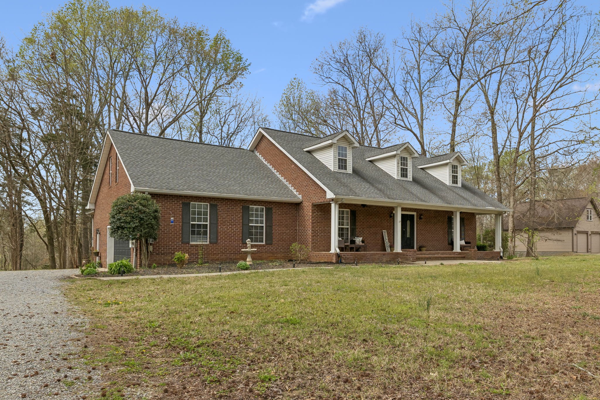 Absolutely gorgeous all-brick home nestled on 2.29 wooded acres in a peaceful, country setting. Offering a total of 4,025 square feet, this property provides exceptional space and flexibility for a variety of living needs.The main level features 2,084 square feet of living space, including 3 bedrooms and 2 bathrooms, along with a spacious 359 square foot bonus/family room. Enjoy direct deck access from the primary suite and a covered back porch overlooking the serene, tree-lined backyard.The expansive 1,581 square foot lower level offers incredible versatility with private access from both the garage and two exterior entrances—ideal for extended living, guest quarters, or future customization.Additional highlights include a roof replaced in 2020 and separate HVAC systems for the upper and lower levels for added comfort and efficiency.The property’s natural setting features a beautiful wooded landscape with a walking trail and fire pit—perfect for enjoying the outdoors year-round.Buyer and buyer’s agent to verify all pertinent information.