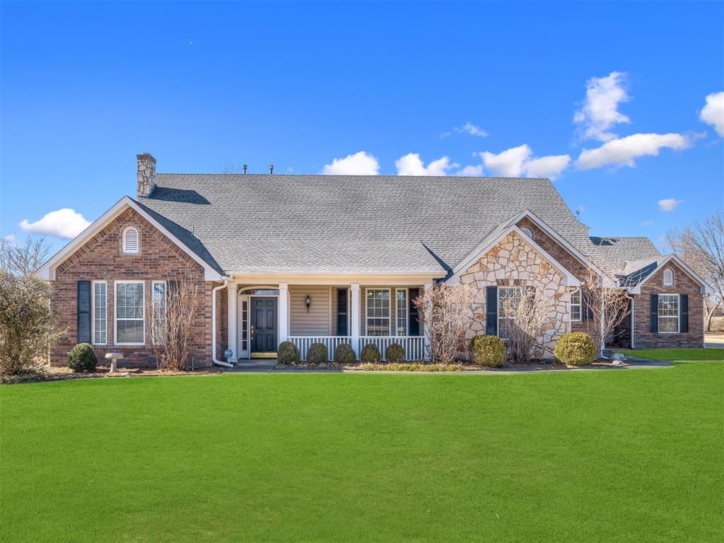 1999-built single-family on 1.01 acres with 3,030 sq ft, 3 beds, 3.5 baths. Features include an open-concept family room and kitchen, a sunken living room with floor-to-ceiling stone fireplace, and vaulted ceilings accented by decorative wood beams. Upstairs bonus room includes a skylight for natural light.Interior:Kitchen with eating area, tile countertops, raised counters, trash compactor, and appliances that convey (refrigerator, stove, microwave, dishwasher). Walk-in pantry with multiple shelves. Laundry room with half bath, built-in cabinets, and seating area. Foyer with tiled floors and reach-in closet. Office with built-in bookshelves; TV/Entertainment room with built-ins.Bedrooms/Baths:Master suite with tile bath, walk-in closets on separate sides, soaking tub, glass shower, and dual vanities. Jack-and-Jill bedrooms share a bath with dual sinks and a shared toilet/shower; both have walk-in closets. Upstairs bonus room offers attic storage.Outdoor/Garage:Double concrete drive to rear; multiple concrete parking pads by a 3-car garage with extended space, cabinets, and a tornado shelter. Large covered back patio and front porch; backyard tree; no neighborhood fence. Attic storage.Utilities:Oklahoma Natural Gas, Oklahoma Electric, City of Moore.