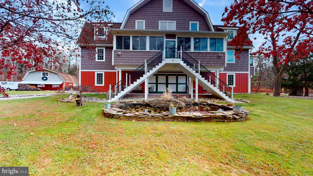 A unique and versatile home awaits the new owner.  Nestled on over 2.5 acres of manicured land this home provides everything anyone would possibly need and more.  Built new in 2018 this home features  6 spacious bedrooms - all with fantastic views and their own private bathrooms. (All are handicapped accessible).  The first floor is built with 10" reinforced cement walls and features a spacious 4+ car garage, an entry/mud room with built-in cubbies, a  recreation  room,  a full bathroom and mechanical room all equipped with radiant heated floors.  As you ride the personal elevator to the second floor you will be transported to an open concept family room kitchen combo that opens to a  back porch with beautiful views.  You will love the amazing  "chef's kitchen " boasting  an expansive island and high end appliances to include a 6 burner  stainless steel commercial gas range, steam oven, double dishwasher, trash compactor, prep and farm sink.  The second floor is equipped with a primary suite that includes its own walk in closet with built ins, a private enclosed porch and a spa like bathroom.  An in-law suite flanks the other side of the house equipped with its own living room, walk in closet and bathroom.  The front entrance has another  porch that overlooks an 18th century farmhouse.  A  powder room and laundry complete this level.   As you continue to the third floor you're taken into what could be a home for a whole other family or a multi generational one.  There are 2 additional primary suites and  Jack-n-Jill  bedrooms connected by a bath,  a kitchenette and a spacious living area.  This floor also features its own laundry facilities and computer work stations.  These  2 primary suites have some of the best views in Broomall.  Continue to the 4th level where the current owner foresees a game room and a saloon w/powder room, but, the possibilities are endless.  Two exterior patios finish off the main home but the fun does not stop there.  For entertainment purposes this property boasts a rickety bridge,  a treehouse,  a creek for swimming and fishing, a pavilion for hosting, a bonfire pit with abundant seating for those fall and summer nights, a brick barbecue/smoker for all your outdoor cooking needs and even an outhouse for your guest's convenience.  On the other side of the property you have an exterior garage with an oversized garage door for all your mechanical needs and plenty of storage.  Above the garage is a studio apartment with a kitchenette and full bathroom.  That's not all this property features.  Start your day with fresh eggs courtesy of Henrietta and the girls from the chicken coop!  Beyond the outbuilding is a large level field which has been used for baseball, football and even as a dirtbike track complete with jumps and burns so get ready to allow your imagination to go wild.  Extras include:  a new well, a greenhouse,  a whole house generator, Koi pond, central vac and fully fenced in with 3 entry gates This is a contractors home built with above standard construction throughout.  Fully insulated and energy efficient.  5 minutes to the Blue Route, shopping, restaurants and less than 20 minutes to the PHL Airport.  Too many other features to mention.  Get ready to be "wowed"!