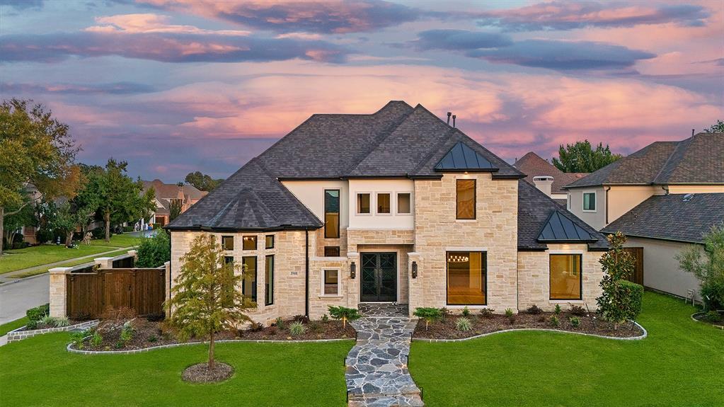 COMPLETELY RENOVATED IN 2025! This stunning home in prestigious Willow Bend Polo Estates was taken back to the studs and rebuilt into a breathtaking soft contemporary masterpiece! Every room offers something rich and unique - including a custom walk-in wine and liquor storage room with a glass wall and built-in cabinets! A fabulous formal dining room boasts built-in cabinets and an elegant round chandelier. It leads to the foyer and the sun-lit two story living room with a see-through fireplace to the office and a double row of windows highlighting the backyard and pool. You'll want to spend most of your time in the spacious family room with built-ins and fireplace with Gas Fyre Spheres, and opens to a gourmet kitchen that will make your jaw drop! Holiday entertaining will be easy with the 48in Wolf gas range with double ovens, Wolf built-in coffee station, custom European cabinets, SubZero refrigerator and Subzero wine fridge and separate SubZero beverage fridge! Glamorous Dekton counters add an elegant touch. Past the family room is the primary suite with pool views and a re-designed bath with walk-in shower, freestanding tub, floating bench, double vanities, additional storage and custom walk-in closet.  Your private backyard oasis features a covered patio, stone gas grill and sparkling pool and spa so you can enjoy it year round! An additional bedroom is also on the first floor! A custom stair railing leads you to a Texas-sized game room with built-in cabinets and storage closets, plus two additional bedrooms, one with a private bath. Other updates you won't want to miss include HVAC units, gas furnace, tankless water heater, completely replaced exterior with stone, garage doors, professional landscaping and so much more! Great location gives you easy access to DNT, 121, 190 plus plenty of shopping, restaurants and entertainment in Plano and Addison.