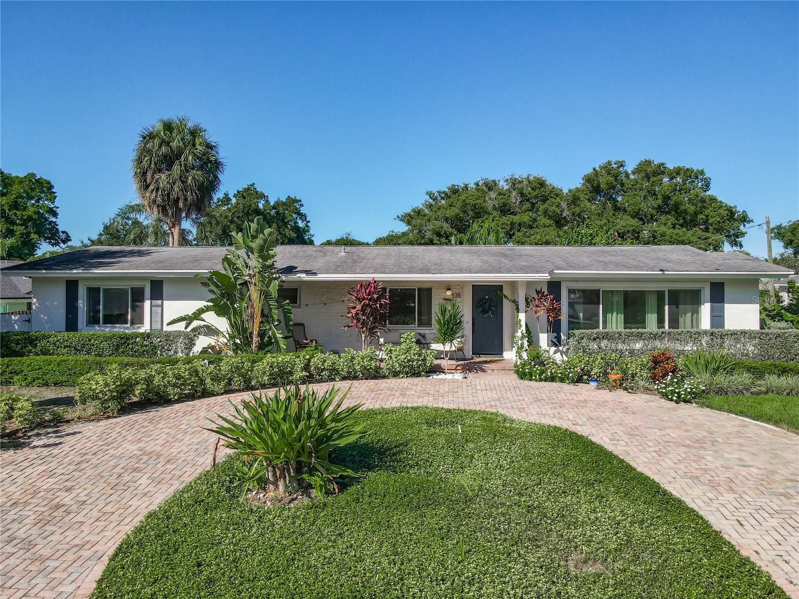 Welcome to your dream home! This beautifully updated 4-bedroom, 3 bath residence is in one of the area's most desirable neighborhoods. Enjoy a perfect blend of comfort, style, and functionality, complete with modern renovations and exceptional outdoor living spaces. This corner lot home with multiple picturesque windows provides an abundance of natural light! Generously sized bedrooms provide ample space for family, guests, or a home office and include 2 master suites, both with 2 closets. Enjoy cooking and entertaining in the stunning, updated kitchen featuring modern appliances, sleek countertops, and plenty of storage. Luxury vinyl flooring throughout but still the charm of original wood floors in 3 of the bedrooms. Step outside to your own backyard oasis with a sparkling pool with a waterfall feature and paver patio, perfect for relaxing or hosting gatherings. Eco-friendly and convenient, the property includes an electric vehicle charging station. Tucked away yet ready in a moment’s notice is space for your boat, camper, or recreational vehicles. The attached one car garage offers secure storage for tools, bikes, toys, golf cart, hobbies or projects. You are just steps from the neighborhood lake lot where members can enjoy incredible sunsets, fishing, or launch your watercraft and enjoy a day on the lake. Dommerich Estates has a strong sense of community and was designed and built around A rated schools so walking and biking to school is safe and easy. The City of Maitland, despite its close proximity to Orlando, is vibrant with a small-town feel providing events designed to foster connections among residents with walkable neighborhoods, multiple parks and downtown street parties and concerts!