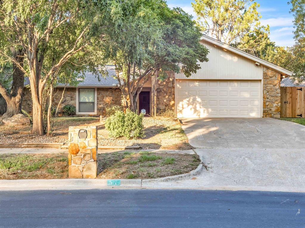 Exceptional home with so much to offer, with quality fixtures, new appliances, and craftsmanship throughout! Built in 1980, this 3-bedroom, 3-bath home offers 2,383 sq. ft. of flexible living space, including a versatile bonus room with its own private bath—offers endless possibilities, whether as a guest suite, home office, or second living area.  As well as two dining areas, and a cozy gas fireplace in the living room. The kitchen features beautiful cabinetry, sleek European-style design, gray granite countertops, and a hidden dishwasher for a streamlined, modern look. The primary suite and guest bath both feature double vanities and walk-in showers.

The front porch with updated pergola welcomes you home, while the spacious, tree-filled backyard with an outbuilding provides privacy and room to enjoy the outdoors. Major updates include a new roof installed in 2021. Situated on a large lot in a well-established neighborhood, this home is truly a must-see!