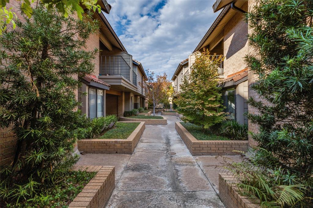 Tucked away within a boutique community of just 12 residences, this elegant condo offers a rare sense of privacy and sophistication in the heart of Dallas. Thoughtfully updated interiors blend sophisticated finishes with the architectural character of the original building design. A beautifully manicured garden walkway leads to the residence, creating a gracious arrival rarely found in an in-town condominium setting. The home also has one of the largest back yard spaces in the community, complete with a fountain. Ideally positioned near The Shops of Highland Park and Turtle Creek Village, and a five-minute walk to the Katy Trail, the home offers exceptional access to some of Dallas’ best shopping, dining and recreation while maintaining a remarkably private, residential feel. This home comes with three assigned parking spaces in an underground, secure-access, shared garage.