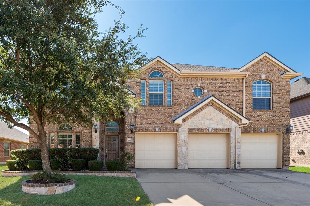 This stunning home offers 5 spacious bedrooms, 3.5 bathrooms, an office, a media room, and a 3-car garage. The entire home has been freshly painted, featuring new wood flooring downstairs and new carpet upstairs, creating a move-in-ready space with a modern feel. Step into the living room with vaulted ceilings and a beautiful stone fireplace, perfect for cozy gatherings. The open floor plan connects the kitchen and living area, making it ideal for entertaining family and friends. The primary suite, located on the main floor, includes a double vanity, soaking tub, separate shower, and a spacious walk-in closet. Upstairs, you’ll find four additional bedrooms, a secondary living area, and a media room—perfect for movie nights or a play area. Enjoy outdoor living in the backyard, featuring a covered patio and a generous yard, great for relaxing, gatherings, or weekend BBQs.