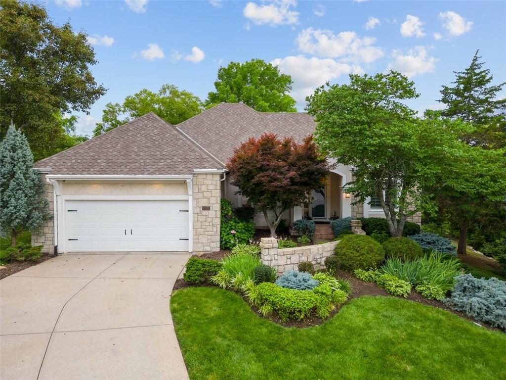 Amazing custom built home in the links of Cedar Creek! This 1.5 reverse ranch has it all, with so much privacy and natural beauty. You will love the open living space on the main level and natural light! Enioy your primary suite on the first floor and laundry room, with two additonal bedrooms on the other side of the home. The kitchen has been intentionally updated as well and comes with stainless steel appliances. The best part - outdoor living space just steps outside from the kitchen! The basement provides over 1,000 square feet of additional living space, a fully loaded bar, and an additional bedroom/bath with a 5th non conforming bedroom! This home has it all. Premier neighborhood in a great location - with top rated golf club Shadow Glen just down the street. Make this your dream home before it's too late!