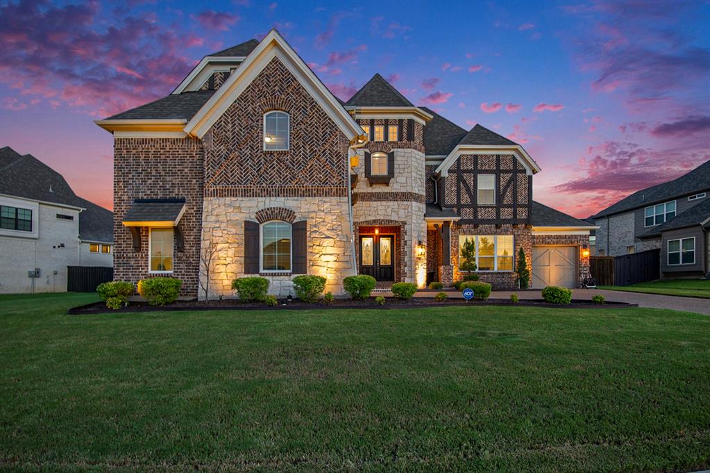 Stunning 5-bedroom, 4-bath brick home in Mansfield featuring a grand double staircase and an open, spacious floorplan. This 2-story home offers two large living areas and a kitchen with granite countertops and plenty of cabinet space—ideal for gatherings and daily living. The master bathroom includes a garden tub, walk-in closet, and a separate shower with a built-in sitting bench. Hardwood floors, tile, and carpet throughout add warmth and style. Enjoy a 3-car garage and a large backyard perfect for entertaining or relaxing. With thoughtful features, quality finishes, and a prime location, this home offers space, comfort, and functionality for any lifestyle.