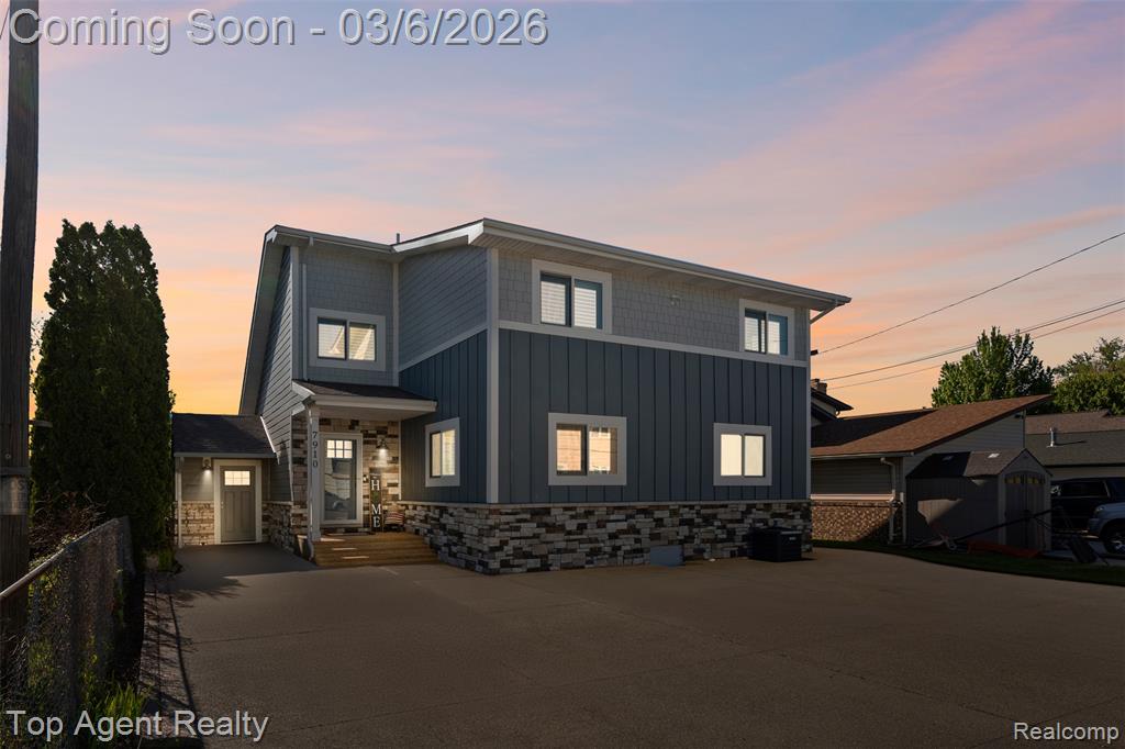 *** OPEN HOUSE: Sun 3/8, 3-5pm *** Nestled in the charming town of Clay, Michigan, at 7910 Anchor Bay Drive, awaits a truly exceptional opportunity. This isn't just a home; it's a lifestyle. Imagine waking up to breathtaking lake view every day, with over 50 feet of your own private lake frontage just steps away. Completely transformed in 2023 with a comprehensive remodel, both inside and out, this residence feels brand new. No detail was overlooked, from the fresh paint and new flooring underfoot to the updated windows that perfectly frame the stunning scenery. The extensive list of updates includes a complete exterior refresh and all-new outlets, All new Plantation Shutters & Power Shades, Attic has been completely insulted with new spray foam insulation. Ensuring modern comfort and peace of mind.Pulling up to the property, you'll appreciate the new driveway,  Opportunities like this are rare, a meticulously renovated home with significant lake frontage in a sought-after location. Don't miss your chance to own a piece of paradise on Anchor Bay Drive