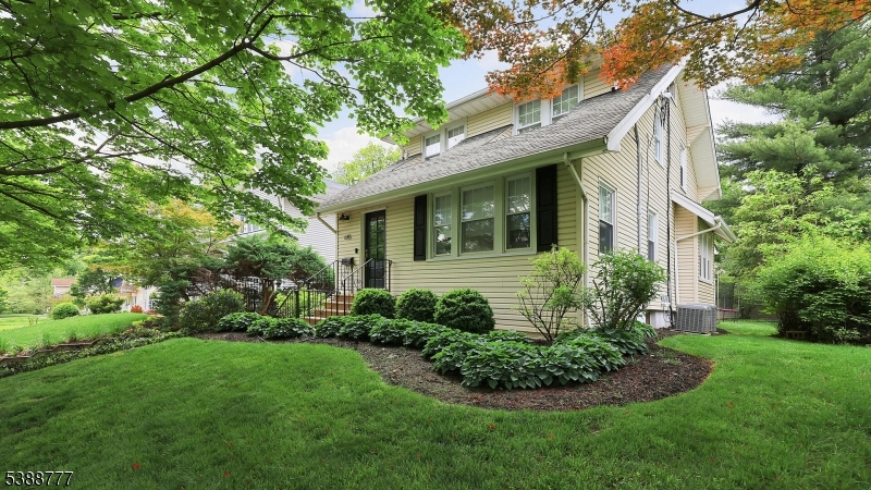 Classic colonial cottage with modern touches on a sought after Westfield street close proximity to downtown, Wilson school, library & the tennis club. Welcome to Westfield in this 3 bedroom & 2.1 bathroom home with a deceivingly large first floor footprint. The foyer boasts coat closets & hardwood floors, the spacious LR is perfect for everyday life with a cozy woodburning fireplace with millwork facade, adjacent is the den with tons of windows, natural light & custom built-in shelves.  The kitchen is perfectly situated near the side door entrance, and features a large countertop prepping space, SS appliances, and tons of upper & lower cabinetry. The kitchen opens to the family room with views of the patio & large backyard green space.  Next up is the formal DR perfect for entertaining in the heart of the home. The first level is complete with laundry, full bath & powder room.  The 2nd level includes 3 bedrooms with hardwood floors. Large main bath with double sink countertop. Pulldown attic stairs with tons of storage in both attic & basement. Enjoy Westfield's shopping, dining, parks, train service, community events and award winning schools.