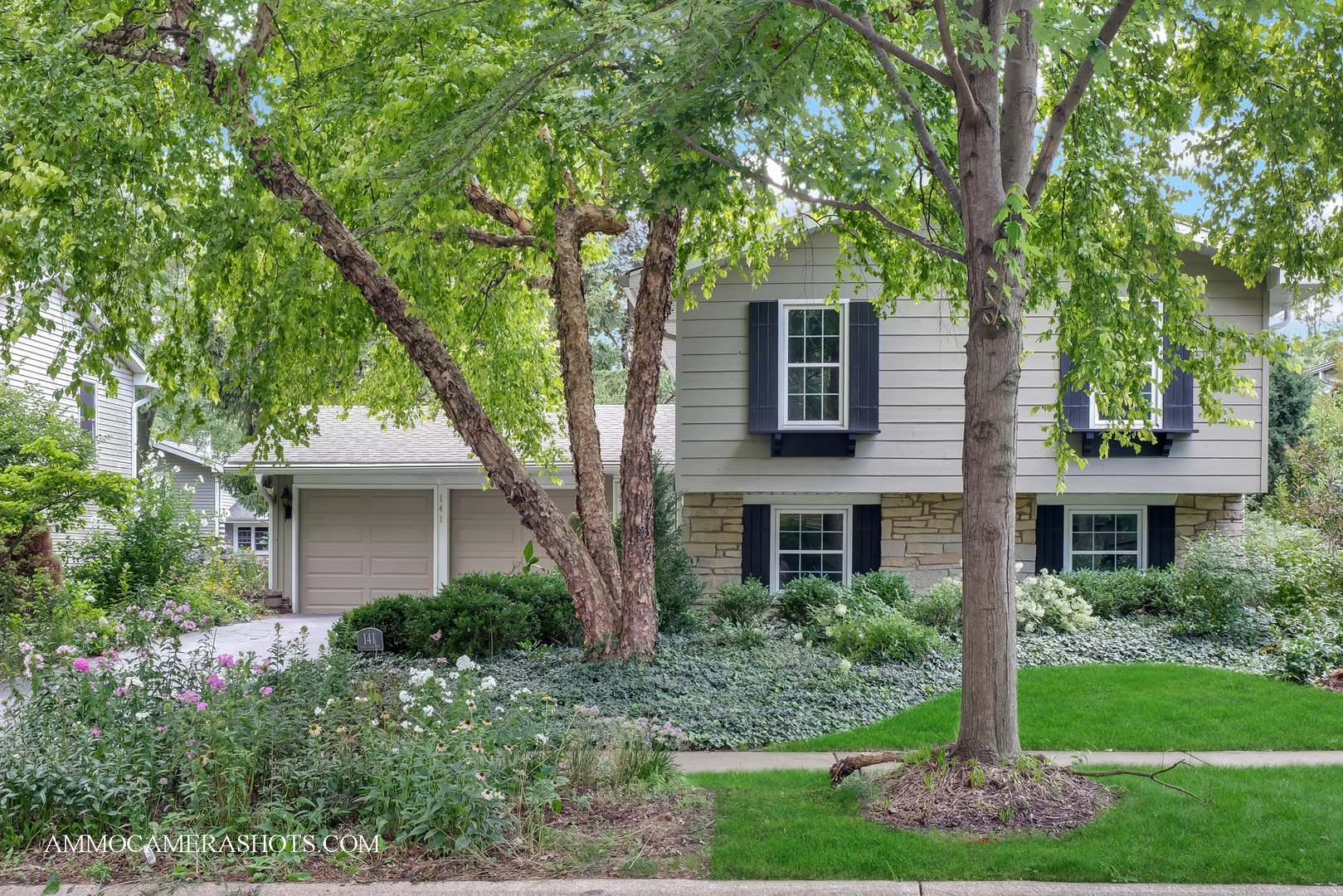 FIRST TIME ON THE MARKET.  This was the family's for ever home and it is time to hand it over to a new family to build their memories in.  When you walk in through the front door you are greeted with a large foyer which will allow you to go to the main floor where you will have your formal living room, dining room and kitchen, down the hall you will have 3 bedrooms, the lower level has a large family room for your entertaining with a walk out to your back yard with which has beautiful gardens, good size laundry room and 2 more bathrooms. This T Style raised ranch has 5 bedrooms. 2 bathrooms.   You can not beat this location.  Free concerts, festivals at the Town Center, Public Library, Bull Park, all walking distance to your home.  Roof was installed 15 years ago, interior of the home has been freshley painted. Exterior is sawcut cedar that was painted 3 years ago, Leaf guard system was instaled. Windows are only 3 years new, Stove is 1 year new, Granite kitchen counters. Furnace was replaced in 2019, Hot water heater is 3 years new.