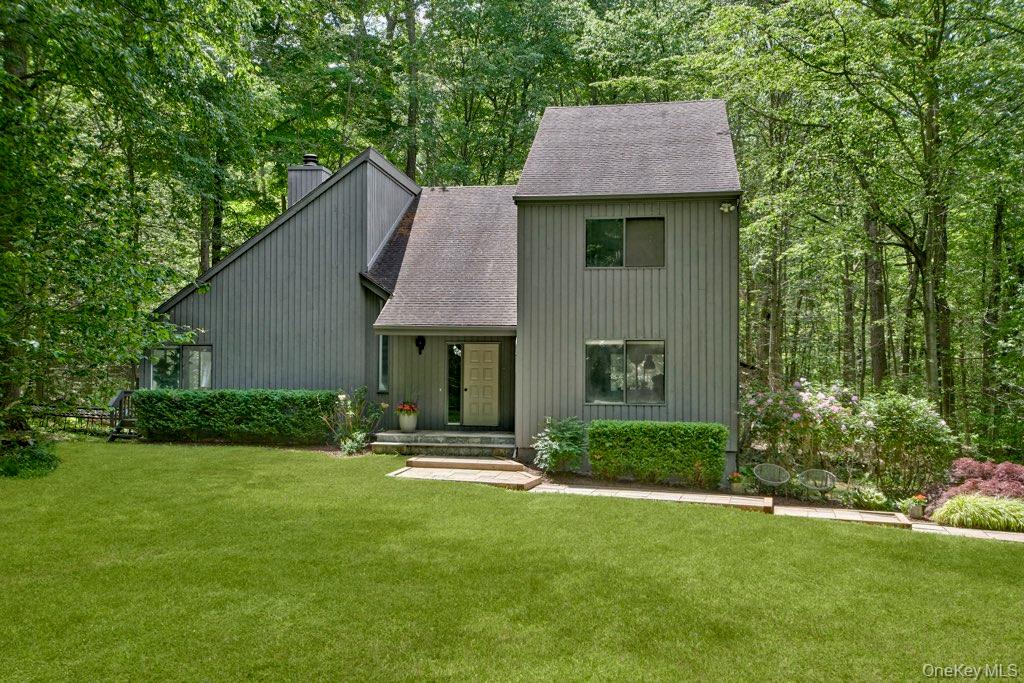 Nestled on a serene, tree-lined cul-de-sac in a wonderful neighborhood setting, this light-filled 4-bedroom, 2.1-bath Contemporary home is privately set on 2 beautiful acres within the award-winning Katonah-Lewisboro School District. Offering the perfect balance of tranquility and convenience, this move-in ready home features an open-concept layout designed for comfortable everyday living.Recently painted inside and out, the home has been beautifully refreshed throughout and enhanced by significant 2024 improvements, including a new HVAC system with heat pump and HEPA filter, ductless split units, new insulation, new well tank and well water filtration system, and a new hot water heater.A dramatic double-height entry creates a striking first impression and opens into beautifully connected first-floor living spaces. At the heart of the home is a stunning family room with soaring cathedral ceilings and walls of windows that bring the outdoors in. The family room opens seamlessly to the spacious kitchen and sits adjacent to both the dining room and living room, creating an easy, natural flow throughout the main level.Just off the kitchen, a private deck offers the perfect spot for morning coffee, outdoor dining, or enjoying the peaceful natural surroundings.The lower level, not included in the home’s overall square footage, provides exceptional additional storage space and flexibility.Ideally located, 10 Bisbee offers easy access to schools, parks, shopping, dining, and major commuting routes, including nearby Katonah and Goldens Bridge Metro-North stations, as well as the charming and vibrant downtowns of Ridgefield and New Canaan, Connecticut. Nature lovers will appreciate the home’s close proximity to several Lewisboro preserves and the renowned 4,000-acre Ward Pound Ridge Reservation, offering endless opportunities for hiking, recreation, and outdoor adventure just minutes away.Combining peaceful surroundings, modern comfort, and an exceptionally convenient location, this special property offers an ideal lifestyle in one of Northern Westchester’s most desirable communities.