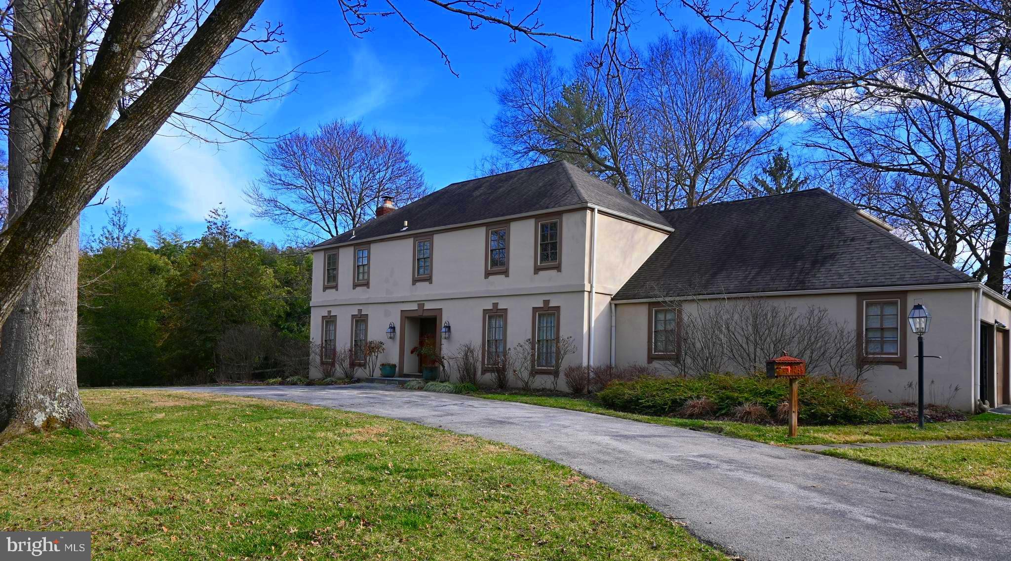 Welcome to 736 Woodleave Road. Situated on over an acre along a picturesque cul-de-sac in the heart of Northside Bryn Mawr, this beautifully appointed residence offers generous living space, thoughtful design, and timeless appeal. Upon entering, a gracious Foyer sets the tone, featuring a generous coat closet and stylish Powder Room. Just beyond, the formal Living Room is anchored by a classic wood-burning fireplace and includes French doors that open to a rear flagstone terrace, overlooking the beautiful backyard. The formal Dining Room, enhanced by detailed moldings, flows seamlessly into the Kitchen. Thoughtfully designed with abundant custom cabinetry, the Kitchen has substantial counter space, an oversized island, and a sunlit Breakfast Room ideal for both casual mornings and elevated entertaining. The Breakfast Room is wrapped in a wall of windows and provides direct access to the covered flagstone patio, creating a seamless indoor-outdoor lifestyle. Just off the Kitchen, a warm and inviting Den with wood-burning fireplace and custom built-ins offers the perfect retreat. A functional Mudroom and Laundry Room provide access to the attached two-car garage, completing the main level. Upstairs, the Primary Suite serves as a private sanctuary, highlighted by a spacious walk-in closet and a spa-inspired bath with double sinks, a soaking tub, and a glass-enclosed shower. Three additional Bedrooms, two with en-suite Baths, along with an updated Full Hall Bath, provide comfort and flexibility. The third floor offers versatile space ideal for an Office, Fitness Studio, or additional flex space. The expansive lower level, complete with a Full Bath, offers endless possibilities for recreation, guest accommodations, or extended living. 736 Woodleave Road offers a special opportunity to own a distinctive home in one of the Main Line’s most desirable neighborhoods and award-winning school districts.